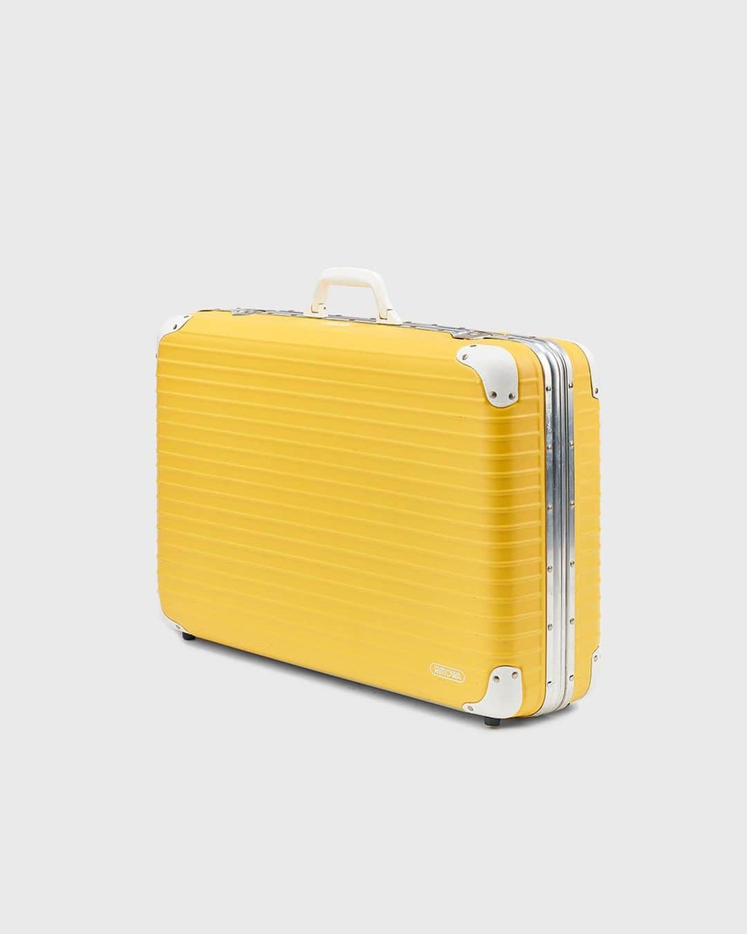 のインスタグラム：「Released in 1990 in shades of yellow, green, blue and red, this archival RIMOWA HOLIDAY collection was inspired by the bold and bright colours of Brazil.  #RIMOWA #RIMOWAarchive」