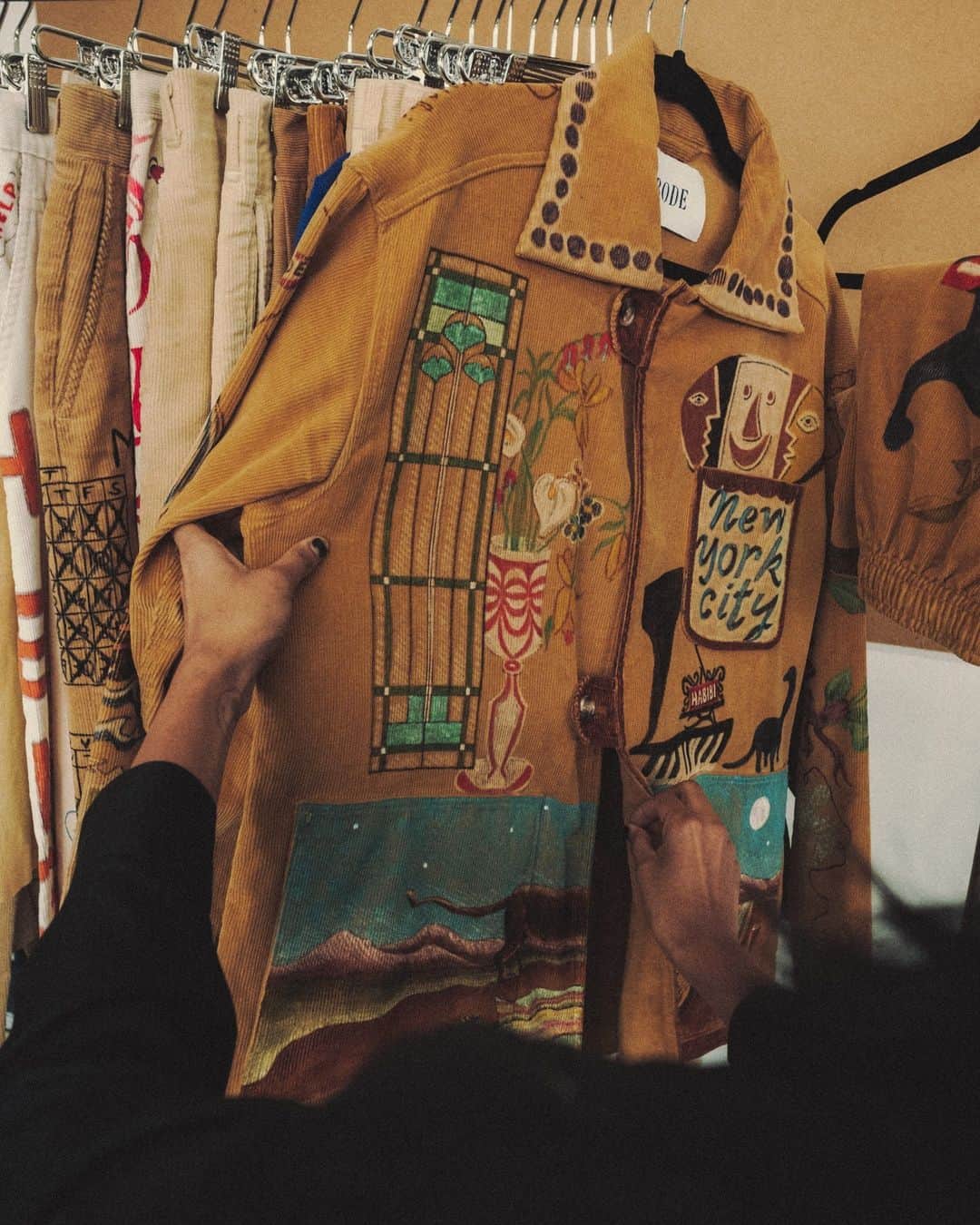 New York Times Fashionのインスタグラム：「The fashion designer Emily Adams Bode Aujla is keeping alive the tradition of senior cords, or corduroy clothes that feature hand-drawn details to document a student’s college experience, all through a high fashion take.  Senior cords seem to have first appeared at Purdue University in Indiana in the early 1900s, according to an archivist at the university, and evolved to become a sort of wearable yearbook for college and high school seniors in the state.The students would use corduroy pants and skirts in cream or yellow as canvases that were illustrated with favorite activities, sweethearts’ initials and other personal details. The practice continued for decades before it started to die out in the 1970s.  Lately, the look has made a resurgence. In 2019, the singer Leon Bridges wore a @bode senior cord suit to the Grammy Awards. The next year, a shirtless Harry Styles wore a pair of senior cord pants in the December 2020 issue of Vogue.  Bode Aujla started selling custom senior cords in 2018 in an attempt to revive the tradition. The garments can include dozens of hand-drawn details, which are typically a mix of images, letters and numbers that are often personal to each person. “We are acting as conservationists and preservationists to ensure this story is continued to be told,” she said in an interview with The New York Times.  Read more about the senior cord tradition at the link in bio. Photos by @timothymulcare.」