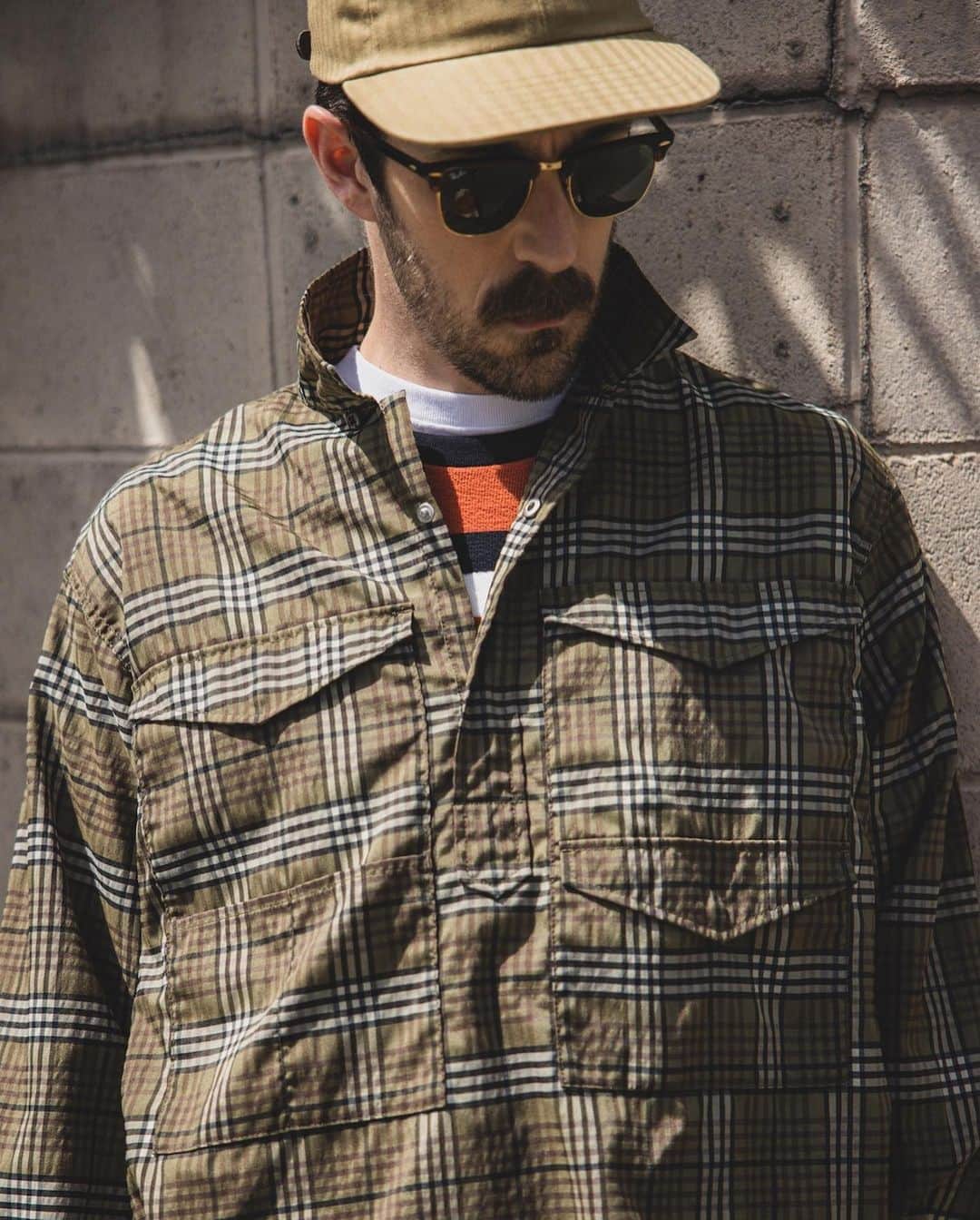BEAMS+さんのインスタグラム写真 - (BEAMS+Instagram)「... The BEAMS PLUS "Adventure Shirt" is inspired by Vintage outdoor wear. ---------- ●Adventure Shirt Nylon Ripstop Stretch Full of pocket details such as a double yoke design from the shoulder to the chest on the front and pockets that also serve as glass holders. Ripstop nylon with a lightweight texture and a touch that feels like a natural material. It also stretches wel, you never feel any stress. The crispness and firmness are also its attractive features of this fabric.  ●Adventure Shirt Ⅲ Hybrid Polyester Check The "Adventure Shirt III" is a pullover style based on outdoor wear from the 1950s. The design of this product is very engaging with four flap pockets on the front and various pockets on the sides. The cuffs are finished with outer-like snap buttons. Based on the idea of making the "Indian Madras" material tougher look and feel, this material is developed with a yarn-dyed check material woven with polyester yarns. The lightness and coolness of the Indian Madras fabric is maintained, while the material is updated to be more practical.  シャツとは思えないほど、細部にこだわったポケットデザインが魅力的。Vintageのアウトドアウエアからインスピレーションした、BEAMS PLUSの『アドベンチャーシャツ』 ---------- ●Adventure Shirt Nylon Ripstop Stretch 前身頃の肩から胸にかけて2重のヨークを施したデザインや、グラスホルダーを兼ねたポケットなど、ポケットディテール満載。 軽い質感、まるで天然素材のようなタッチ感が特徴のリップストップナイロン。ストレッチの機能もあり、ストレスフリーな着心地を実現。シャリ感とハリコシが魅力的。  ●Adventure Shirt Ⅲ Hybrid Polyester Check 1950年代のアウトドアウエアをベースにプルオーバー型を採用した『Adventure Shirt Ⅲ』。前身頃に4つのフラップポケットや、サイドに多彩なポケットを配置したデザインが魅力的。カフ部分はアウターライクなスナップボタン仕様。 『インディアンマドラスの素材を、もう少しタフな雰囲気で。』そんなイメージで作り込んだこの素材は、ポリエステル糸で織り上げた先染めチェック素材。軽さや清涼感はインディアンマドラスの雰囲気を保ちつつ、より実用的な素材へとアップデートしています。 . @beams_plus  @beams_plus_harajuku @beams_plus_yurakucho  #beamsplus」5月11日 19時55分 - beams_plus_harajuku