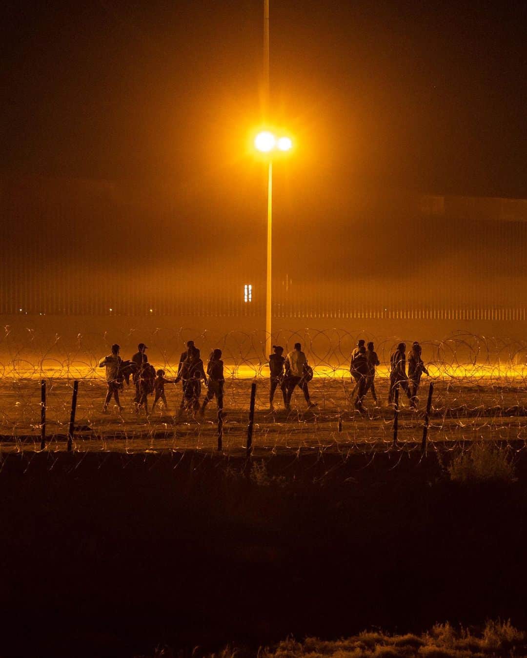 ニューヨーク・タイムズさんのインスタグラム写真 - (ニューヨーク・タイムズInstagram)「Masses of people have been rushing to the Mexican border on buses and planes in recent weeks, as a pandemic-era health restriction that the U.S. used to expel migrants expires.   But in Ciudad Juárez, right across the border from El Paso, they are increasingly arriving on a freight train so dangerous it is known either as “the beast” or “the train of death” because so many migrants have fallen off and lost limbs or have been killed.   Most riders on the train on Monday were from Venezuela and had traveled for months to reach Mexico, traversing multiple countries and a brutal 70-mile long stretch of jungle connecting Central and South America. Along the way, some were robbed and kidnapped. They boarded the train in secret in Mexico City, and said it was the only way they knew they could make it north. The metal walls of the train got so cold at night that it was hard to sleep, and so hot during the day that touching them with bare skin was painful.  Some migrants say they have heard the border will be open when the pandemic health rule, known as Title 42, lifts on Thursday night. Others believe the opposite, that it will be completely shut. Neither is accurate. Yet regardless of their view, many people believe they have no time to waste and are heading directly toward the U.S.  @nataliekitroeff, The Times’s Mexico City bureau chief, interviewed migrants near the border, and the photographer @alecegarra traveled on a freight train carrying migrants bound for the U.S. Tap the link in our bio to learn more about this journey.」5月11日 7時17分 - nytimes