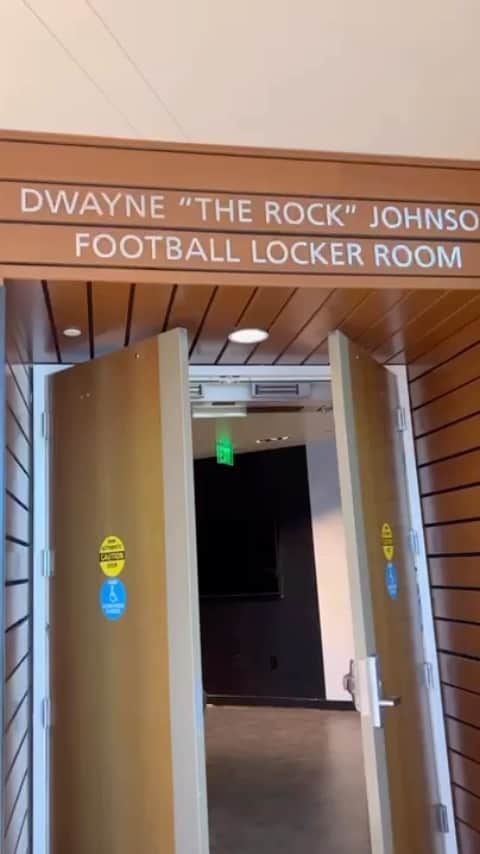 ドウェイン・ジョンソンのインスタグラム：「Welcome to the Dwayne “the Rock” Johnson Football Locker Room at the one and only, University of Miami 🙌🏾 THE U   At Miami, I had the privilege of playing with some of the greatest players to ever play the game.  Hall of Famers.   And more importantly, WE had the honor of creating a brotherhood that was forged in our daily discipline ~ to outwork our competition and ALWAYS be the hardest workers in the room.  Lifers.   This gift is my way of showing love and gratitude to a football program that helped shape and define who I am today as a man.  Ups and downs and everything in between.   Best of luck this season to my brother & Head Coach Mario Cristobal & his coaching staff.   And to our program’s anchor - our players,   No team in the country will outwork you.   It’s our obsession and our appetite for disruption.   See you at the top.   DRJ  #brotherhood  #theU」