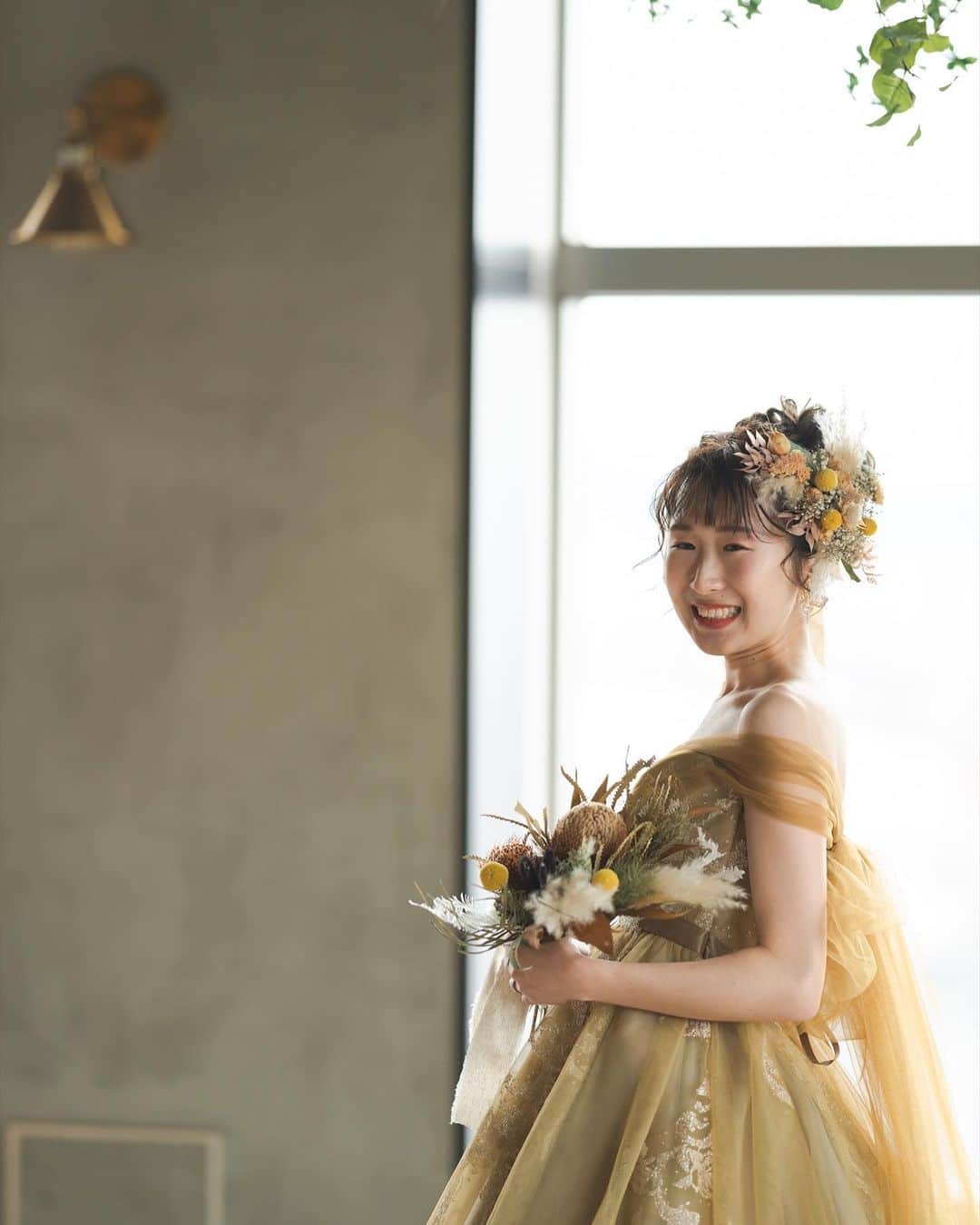 THE STYLE_OKAYAMA【公式】さんのインスタグラム写真 - (THE STYLE_OKAYAMA【公式】Instagram)「. バックリボンが印象的なイエローのドレス  ドレスの色味とブーケとヘッド装花を合わせた トータルコーデが、花嫁さまのふんわりとした 可愛らしさを引き立てます . ——————— . @thestyle_okayamaをフォローし #ザスタイル岡山 をつけて 検索してくださいね♪ . #スタイルズ花嫁 #ザスタイル岡山 #thestyle岡山 #ブライダルハウスtutu #シェアーズヘアメイク #岡山花嫁 #岡山結婚式 #プラコレ #DRESSY花嫁 #カラードレス #イエロードレス #ナチュラルウエディング #ドレス色当て #ヘッド装花 #パンパスブーケ」5月30日 16時00分 - thestyle_okayama