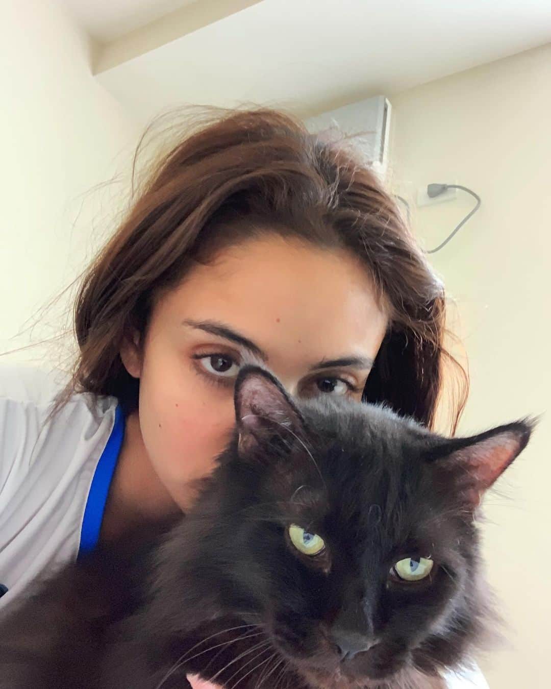 ミーガン・ヤングのインスタグラム：「My favorite photos of us 🖤 Same vibes, same feels, looks sungit on the outside but we’re really softies 🥹 My baby boy Salem was with us for 13 years and I’m so happy I had all those years to be your momma my squishy, sungit pero malambing, matakaw sa pagkain bb 😭 It’s been a week since you’ve crossed the rainbow bridge but it’s been so hard trying to process this… I loved when I would rest my head on you and I could hear you purring loudly. I loved when you would sneak jump on my lap when I was gaming on my pc. I loved when you would be malambing but only wanting to eat my hair hahahah. I loved when you would just snuggle with me when I would take a nap. I loved when you would steal the chicken we were prepping to cook 🤣 I loved when you would always be by the door when we got home. I love you so much my baby boy Salem 🥹 Rest well… rest easy my love… 🖤🖤🖤」