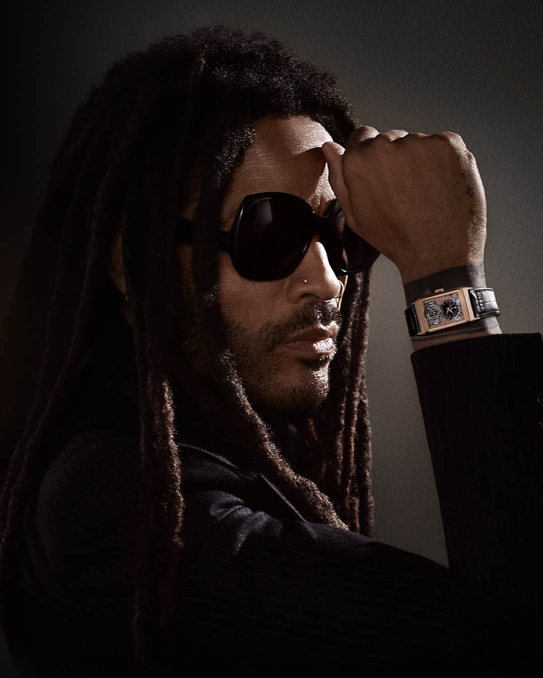 ジャガールクルトのインスタグラム：「Starring Lenny Kravitz. #Reverso _ Lenny Kravitz @lennykravitz Reverso Tribute Duoface Tourbillon  Designed, made and assembled in our Manufacture _ One of the preeminent rock musicians of our time, an accomplished actor and successful designer, Lenny Kravitz makes his debut as our Global Ambassador in the new campaign ‘The Watchmaker of Watchmakers’. He wears the elegant and technically sophisticated Reverso Tribute Duoface Tourbillon. _ #JaegerLeCoultre #Reverso #TheWatchmakerOfWatchmakers #LennyKravitz」