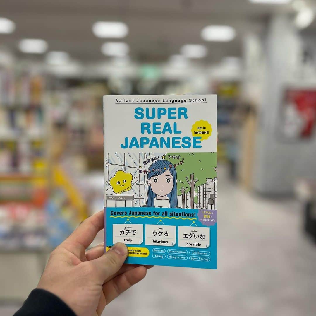 Valiant Language Schoolさんのインスタグラム写真 - (Valiant Language SchoolInstagram)「New* 📖 out Now! "Super Real Japanese." Published by KADOKAWA @valiantjapanese  Promo code: LUFFYMAY5 To get 10% off. (Until 5/31) Only 40 copies available!  . . If you’ve been studying or speaking Japanese for awhile, you may have noticed that the Japanese language used in textbooks and classrooms can be quite different from the language spoken by native Japanese speakers in everyday situations. This is where "Super Real Japanese," a newly published book by Valiant Japanese Language School, can come in handy.  "Super Real Japanese" is a 208-page book that compiles a wide range of practical Japanese phrases and expressions commonly used by native speakers. Unlike traditional textbooks, this book focuses on everyday language that is often omitted from formal language education, such as slang, idiomatic expressions, and colloquialisms.  The book is organized thematically, with chapters covering topics such as greetings, food and drink, transportation, and dating. Each chapter begins with an introduction to the topic and is followed by a series of related phrases and vocabulary with accompanying translations, and explanations,. The book also includes cultural terminlogies and tips to help readers understand the context and nuances of each phrase.  One of the strengths of "Super Real Japanese" is its emphasis on practicality. The phrases and expressions included in the book are all ones that are commonly used in everyday situations, making them immediately applicable for anyone who wants to improve their ability to communicate with Japanese speakers.  94 Situations 🤯 / 205 Pages 📖  Topics such as: Real emotions Fun feelings Relaxed feelings Being thankful Feeling motivated Feeling impressed Surprise responses Conveying discontent Thoughtfulness Humbleness Encouragement Accepting / declining an invitation And whole bunch more!」5月12日 17時39分 - valiantjapanese