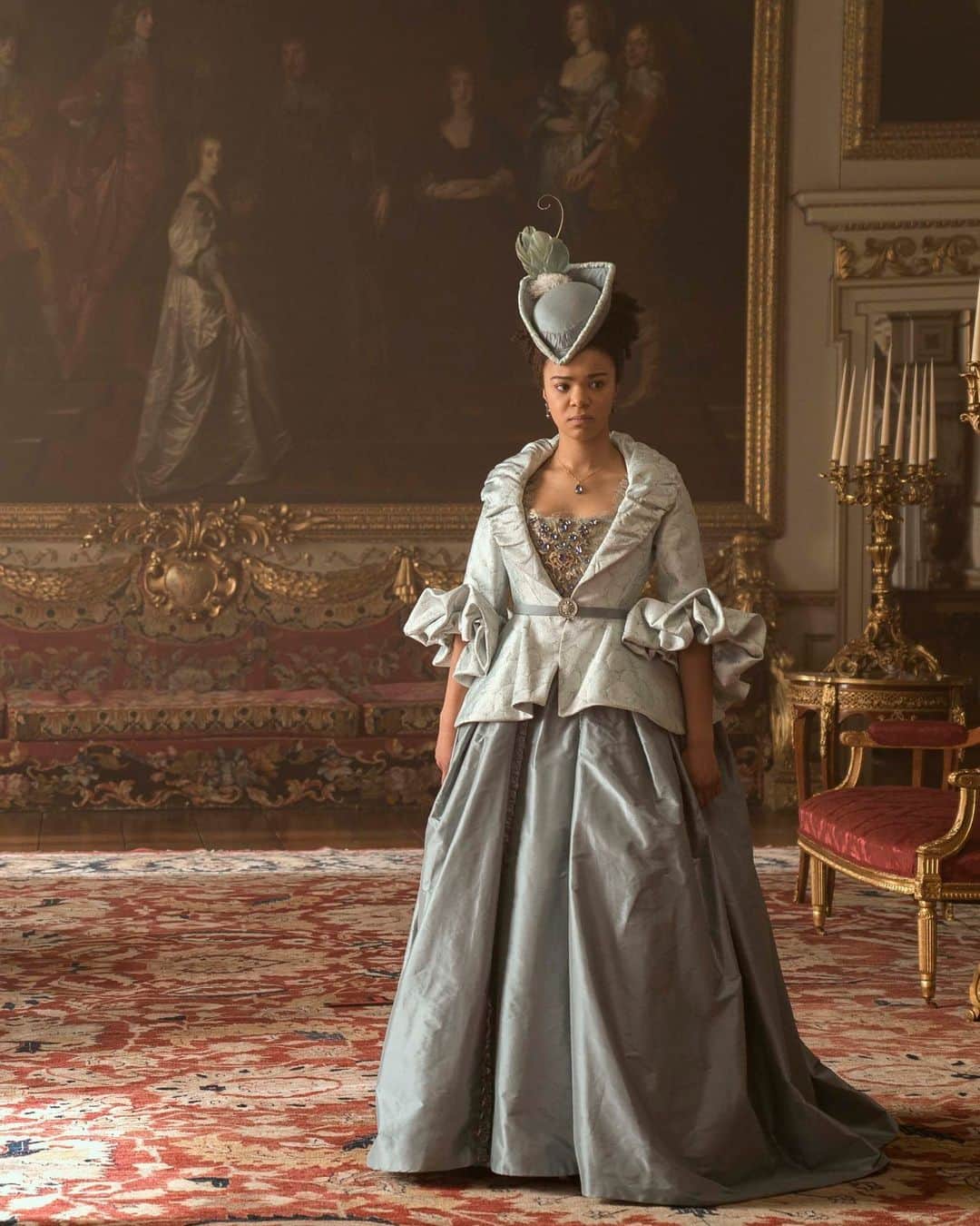 New York Times Fashionさんのインスタグラム写真 - (New York Times FashionInstagram)「In an interview with The New York Times, a costume designer for “Queen Charlotte,” Netflix’s new “Bridgerton” spinoff, discussed creating clothing for royalty and looking to the House of Windsor for real-life inspiration.  Lyn Elizabeth Paolo and her fellow costume designer, Laura Frecon, created more than a thousand costumes inspired by the Georgian and Regency periods, including an estimated 500 crowns. They combined research on real-life royals with more modern inspiration from Dior and Alexander McQueen. “We’re having a little fun with history,” she said.  The series’s characters are constricted by their circumstances and their costuming alike. Minutes into the first episode, for instance, Charlotte is cinched into a gown encrusted with sapphires and squeezed into a marriage to King George III of Britain. The show, created by Shonda Rhimes, weaves the pair’s eventual love story together with threads on race and mental health.  @callieholtermann spoke to Paolo about her inspirations days after the coronation of King Charles III — and Paolo weighed in on her favorite looks from the real-life coronation. Read the full interview at the link in bio. Images via Netflix」5月13日 4時15分 - nytstyle