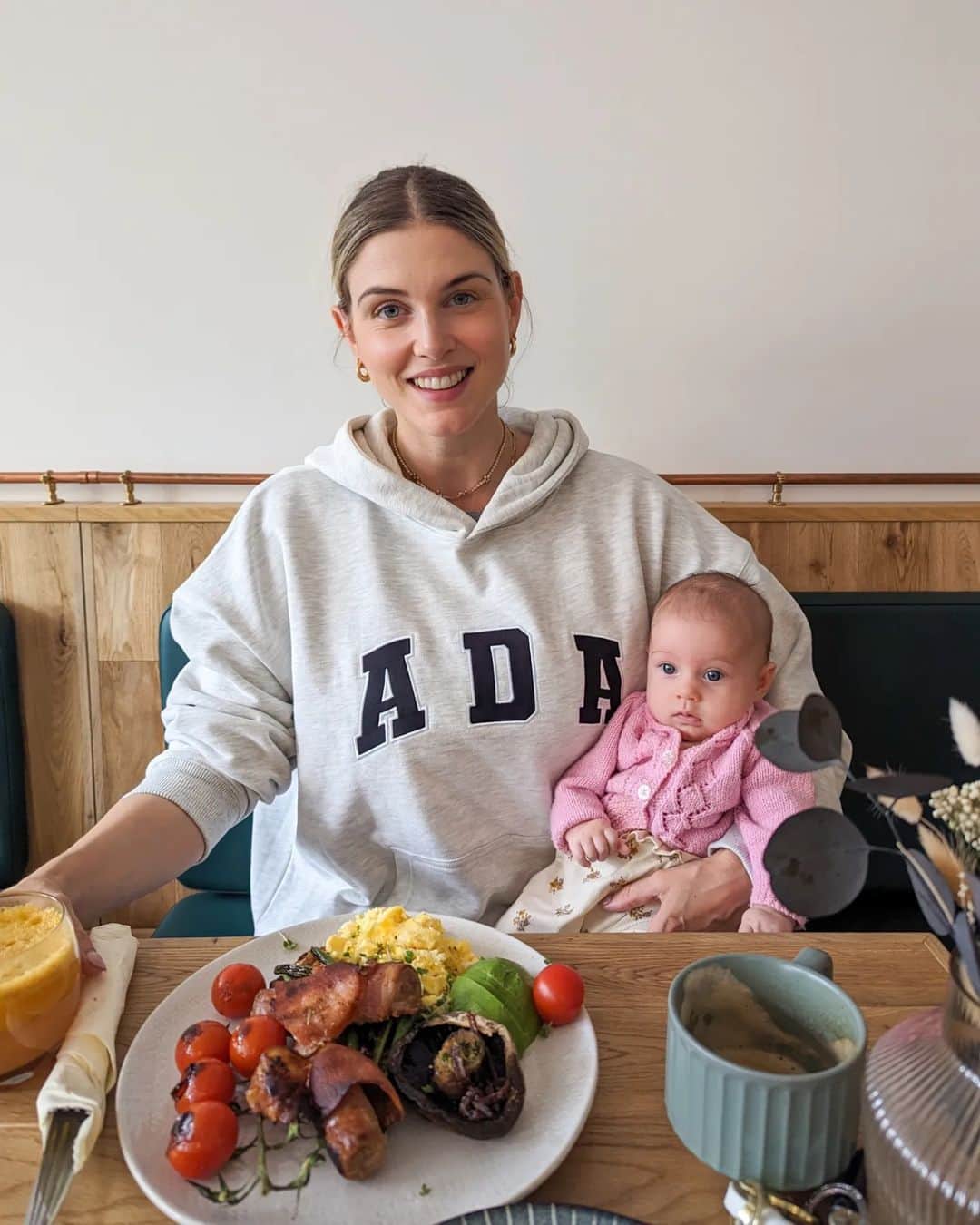 Ashley Jamesさんのインスタグラム写真 - (Ashley JamesInstagram)「I love Saturdays as a family of four. 🍀❤️  It's crazy to think it's only been this way for 10 weeks. It feels like it's always been this way!  Here's how today has looked:   🌄Tommy's got up with Alf at 5am. He sleeps in the spare room as he can have a solid night sleep, whilst I am up with Ada throughout the night in our room. We look forward to the day Alf lies in past 6, but for now Tommy likes his mornings with Alf. They go for a run and pick any shopping we need.  💙 I have cuddles in bed with both babies whilst Tommy gets up and ready.  🩳 Tommy and Alfie went swimming - and Ada and I came to watch. I signed Alf up to swim classes When Ada was born so they have a nice activity to look forward to. Alf got promoted today to the next level.  💩 Ada had a poo explosion and I didn't take wipes out with me. Thank goodness I keep a nappy caddy in the car full of spare clothes and nappies for both babies. Fully recommend.  🤍 We went for brunch whilst Alf had his nap. 🙏  📚 Alf woke up and we had cuddles on the sofa reading his favourite book - Peace at Last. It used to be my favourite too and we read it 1000x a day. I manage to feed Ada hands free by rolling up a muslin and putting it under my b00b.  👨‍👩‍👦‍👦 Now it's an afternoon of getting the house in order and playing.  Oh, and I bought the Adanola hoody that says Ada. I couldn't resist.  Life looks very different than it did a few years ago, but I feel very happy as a family of four. ❤️」5月13日 23時46分 - ashleylouisejames