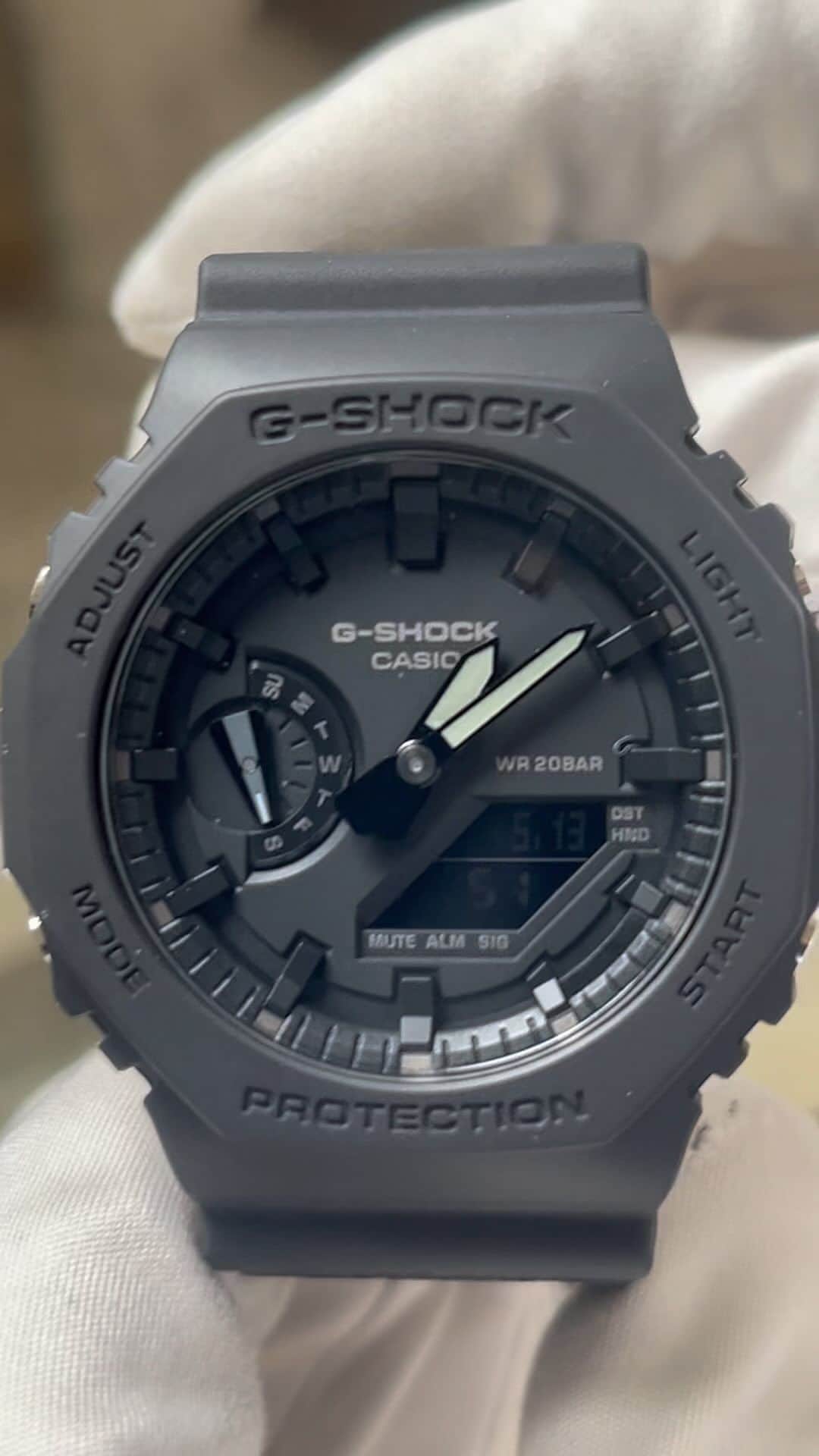 NAKANIWA WISPのインスタグラム：「G-SHOCK 40th Anniversary REMASTER BLACK ANALOG-DIGITAL 2100 Series GA-2140RE-1AJR price：￥21,450-  This is the limited edition "G-SHOCK 40 th Anniversary REMASTER BLACK (Remaster Black)" series from G-SHOCK, which will celebrate its 40 year anniversary in 2023. In the image of milestones and stone monuments, the band is engraved with the names of all the models of the past 40 years and is finished in all black. The side buttons are stamped with a star mark, and the bezel and band are made of biomass plastic. The case back features the 40 th logo by Eric Hayes, who also designed the G-SHOCK 25 th, 30 th, and 35 th logos, while the swing wheel is stamped with a star mark representing "40."  ■ Inquiry NAKANIWA WATCH 4-10-3 Minamisenba, Chuo-ku, Osaka-shi, 542-0081 TEL: 06-6251-7573 Open from 11:00 to 18:30 Closed on Wednesdays LINE ID: @910caqbg #NAKANIWA #NAKANIWAWATCH #仲庭時計店 #Japanwatch #5600SERIES #GA2140RE1AJR #GSHOCK」
