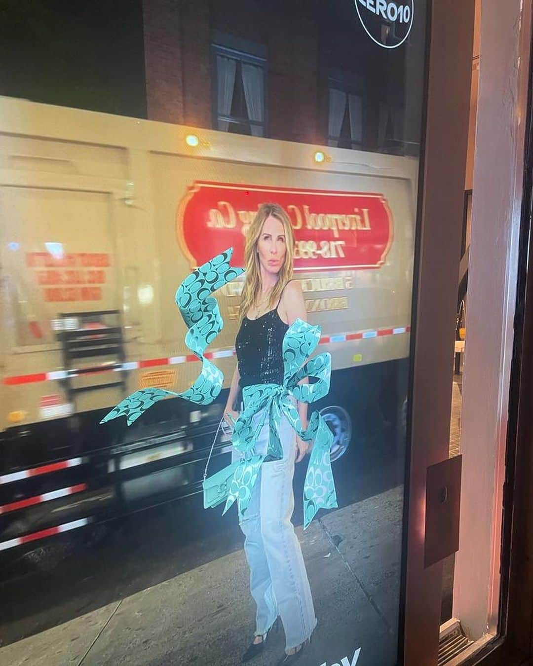 キャロル・ラドジウィルのインスタグラム：「Me & my gay husband (Gubby) are the new spokespeople/models for Coach. 😉😉  I can’t explain this but if you walk by the Coach store on Prince & West Broadway you become part of their billboard. Technically speaking, it’s an AI thingy. 😎😎  @gregcalejo 💁🏼‍♂️ @coach 👜」