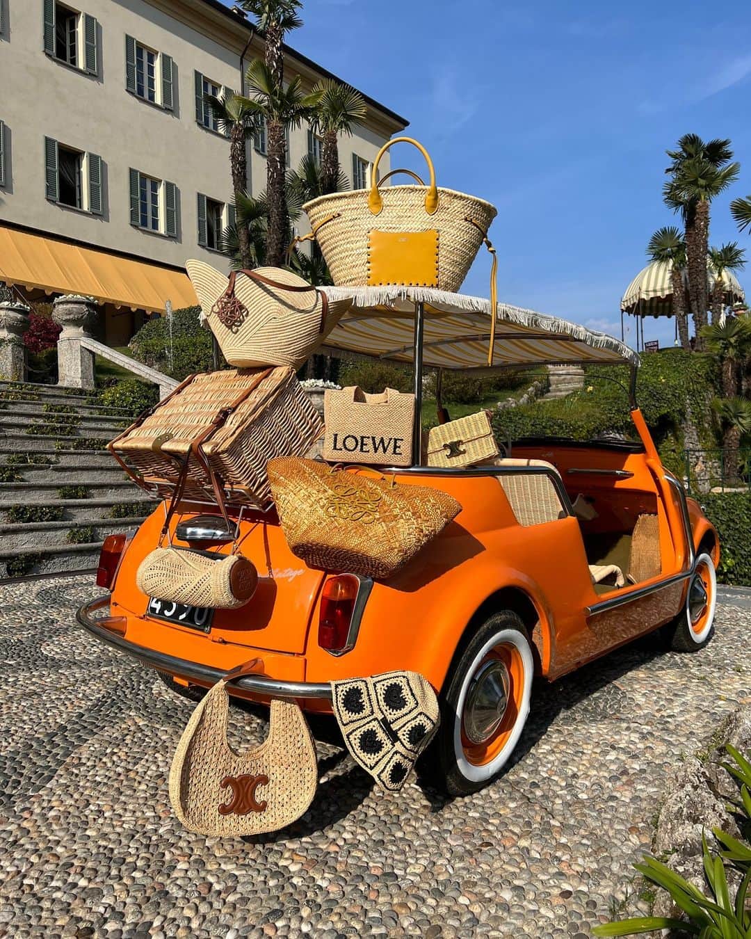 Harrodsのインスタグラム：「When you couldn’t pick your favourite basket bag so you packed them all 💅  Find your summer essentials from #Loewe, #Celine, #StellaMcCartney, #IsabelMarant and more in Luxury Accessories on the Ground Floor and Womenswear on the First Floor.  Location: @passalacqualakecomo @abercrombiekent  #Harrods #HarrodsFashion」