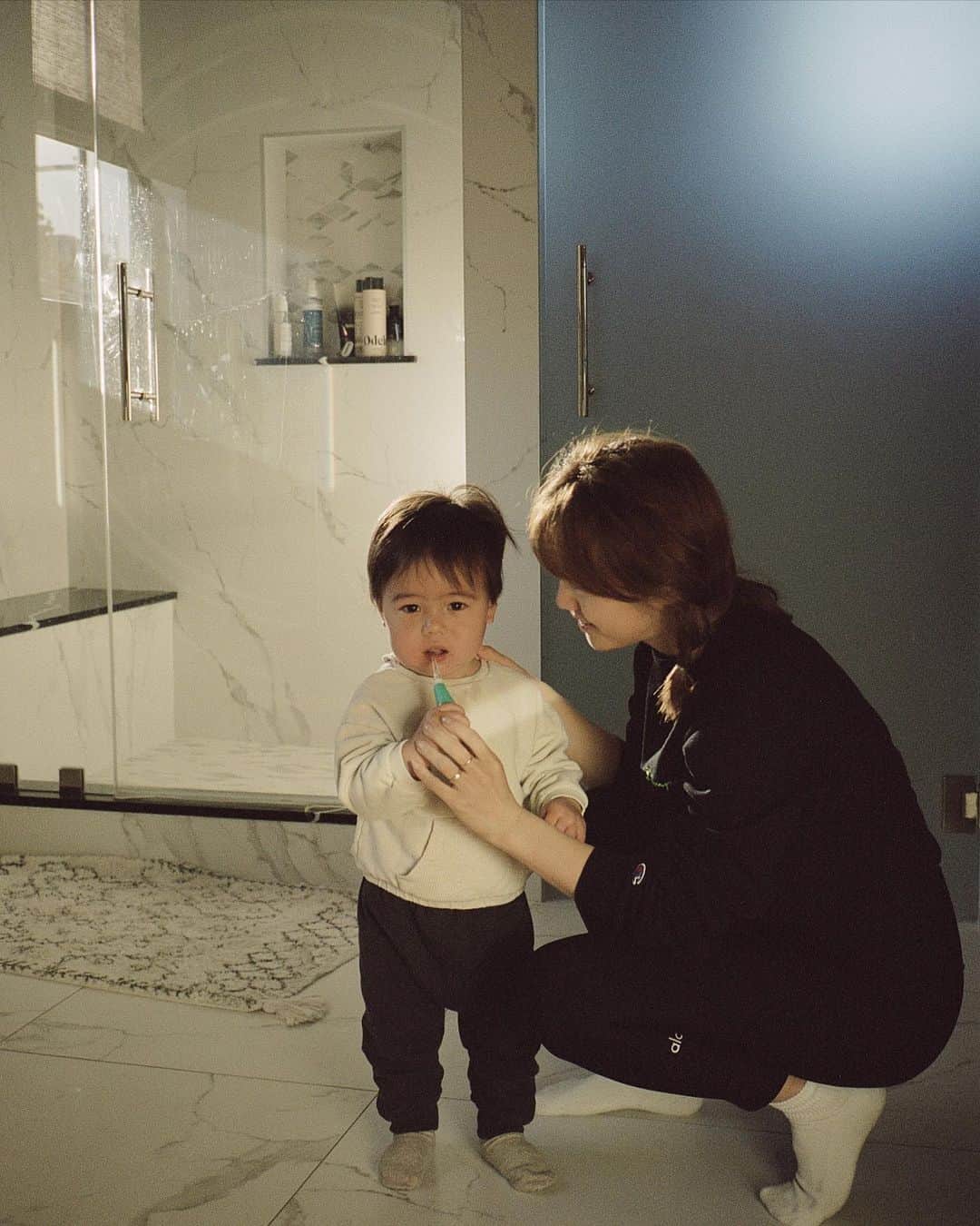 Jenn Imさんのインスタグラム写真 - (Jenn ImInstagram)「The first year of motherhood unlocked this secret trap door in my mind. Now I couldn't help but perceive the world through this new lens. My primal side kicked in and I was in full blown protect-my-son mode. AlI I saw were catastrophic risks and existential threats (and guys, there are a lot... 😂). My chronic need to optimize would never guarantee complete safety because there are simply too many uncontrollable variables.⁣ ⁣ I had to learn how to let go. ⁣ ⁣ It became very apparent how closely fear and love are related. When you care about someone so much, you want to protect them at all costs. It's fear of losing who and what you love. If I didn't love it, then I wouldn't give a flying furk what happened. It made me empathize with Umma and how difficult it must have been to experience this. Many parents do. ⁣ ⁣ Now, I actually enjoy hearing my parents nag at me, reminding me to do a task that I know I should have completed already. It comes from a place of deep love. Their concern is a way they show their love.⁣ For some parents it's the only way they know how to show their love. ⁣ This year, my postpartum anxiety finally lifted its sticky grip from me, I've relaxed into this new version of myself. Seeing my son grow older each day as been life's most generous gift. He is my muse and the glue to our family. ⁣ ⁣ Happy Mother's Day to all the moms out there working, worrying and werkinggg endlessly. We got this! ♥️」5月15日 11時26分 - imjennim
