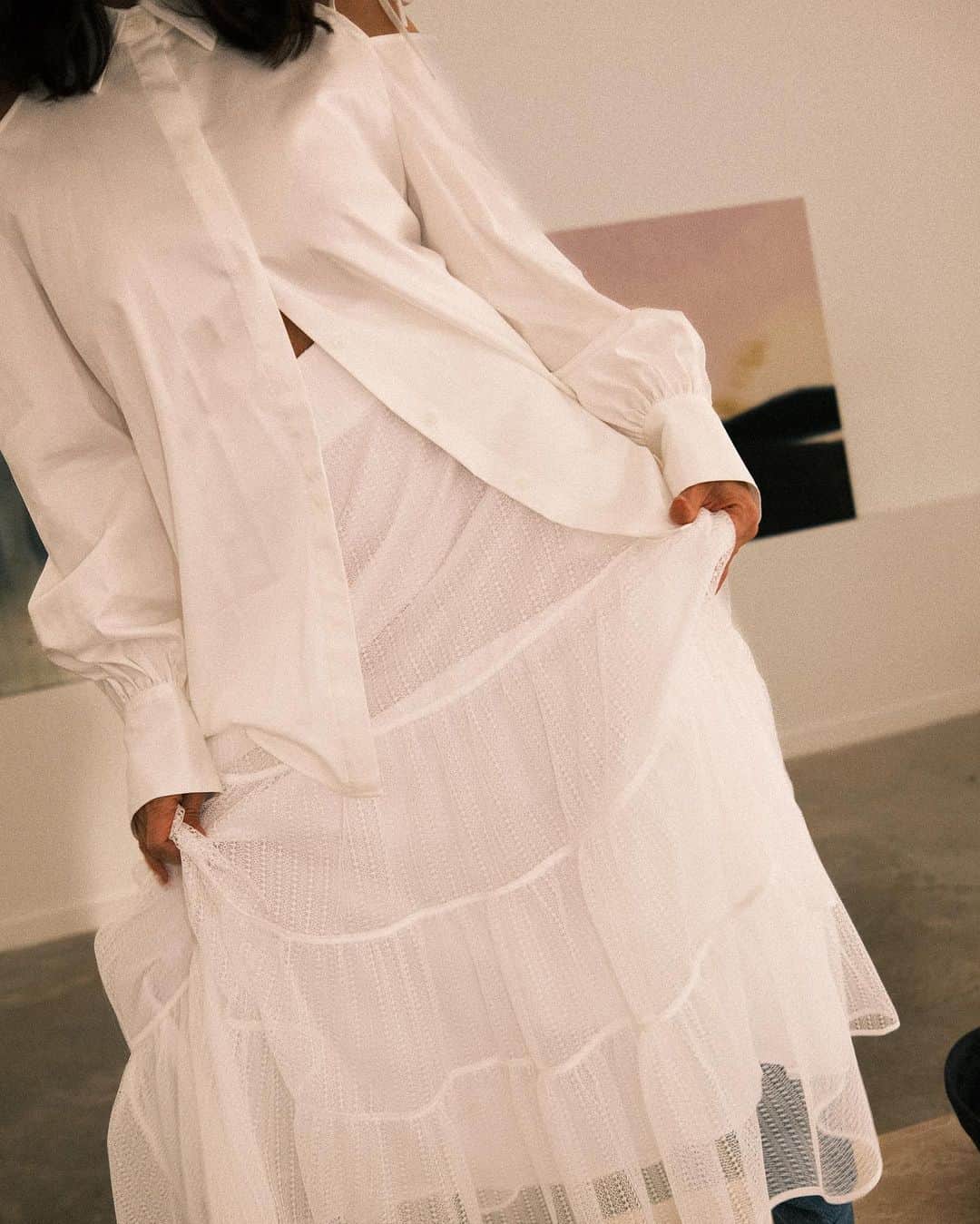 アディアムのインスタグラム：「A play on textures. @KristenGiorgi.Studio wears the Obi Shirt and Hanabi Skirt from the #ADEAM Spring Summer 2023 Collection.」