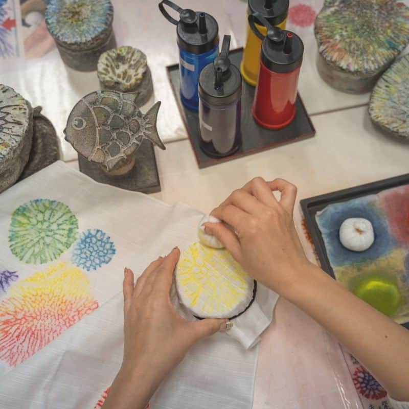 Be.okinawaさんのインスタグラム写真 - (Be.okinawaInstagram)「【Multicolor Dyeing with Coral Fossils】 Coral is a fundamental part of the history and culture of the Okinawan islands. Living coral reefs serve as natural breakwaters to protect the island’s coastal areas while providing valuable habitats for marine life. Ryukyu limestone — the soft, porous limestone formed by petrified coral reefs — has long been used as a building material for stairs, pavement, and stone walls. Fossilized coral has also been used as a protective good-luck charm in Okinawa through the ages.  Link in bio☝  #japan #okinawatrip #visitokinawa #okinawajapan #discoverjapan #japantrip #japantravel #okinawa #visitjapan #explorejapan #corals #coraldying」5月15日 20時00分 - visitokinawajapan