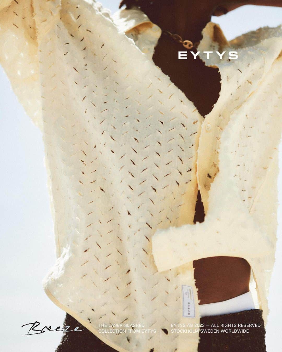 エイティーズのインスタグラム：「A new take on a classic shirt. Discover the laser-slashed collection from EYTYS, for a breath of fresh air.」
