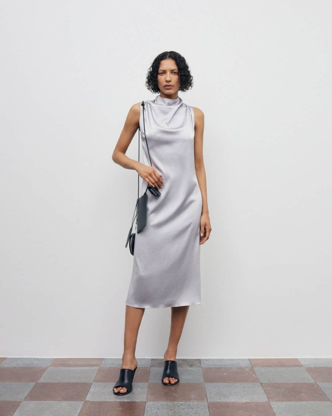のインスタグラム：「Womenswear sees directional silhouettes with subtle dress shapes tailored to highlight the wearer's body, including the Odys sheath dress. #TigerofSweden」