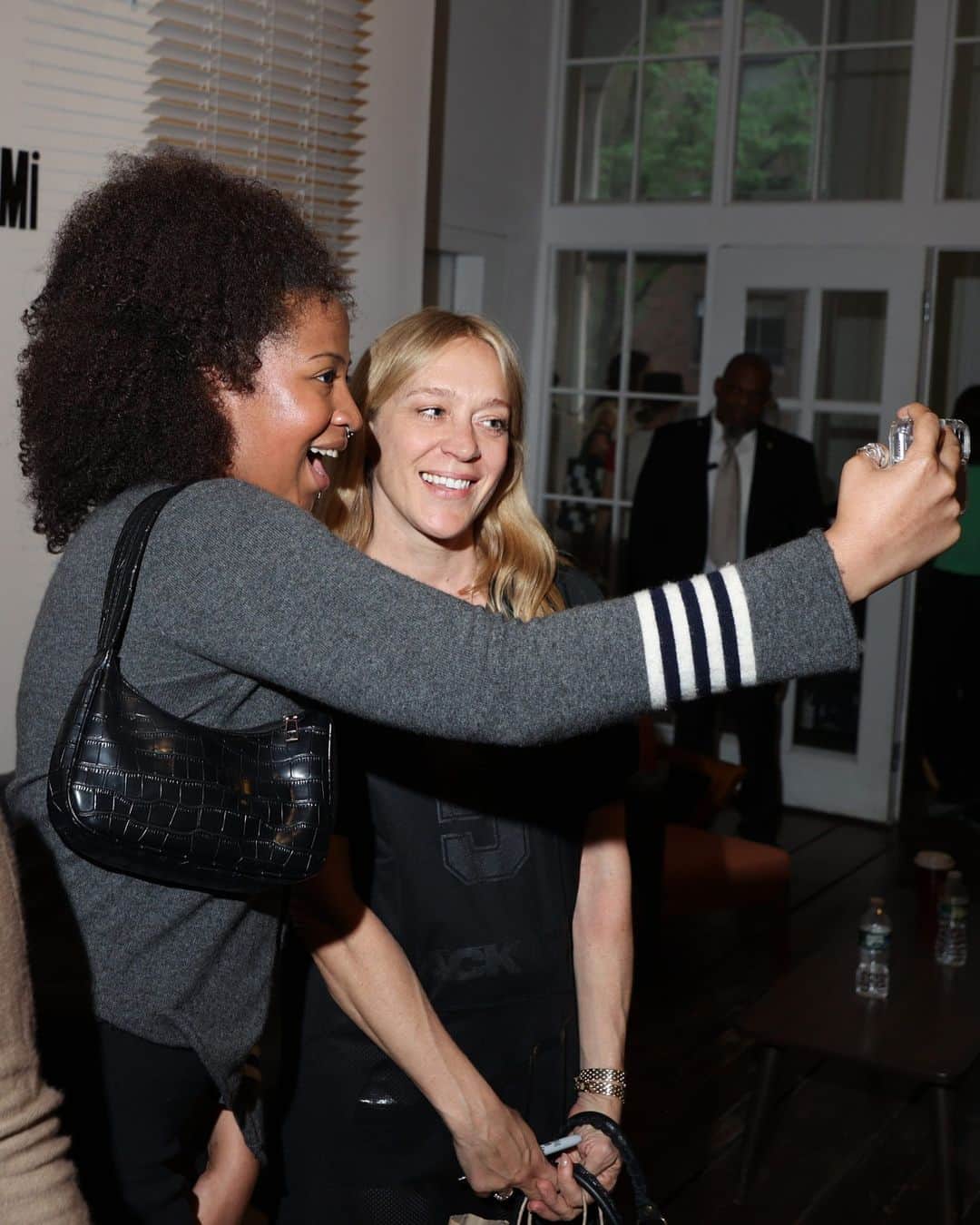 New York Times Fashionのインスタグラム：「On Sunday, fashion lovers flocked to shop from Chloë Sevigny’s collection of garments in what was advertised on social media as the “sale of the century.”  @chloessevigny held the sale at a studio space in the NoHo neighborhood of Manhattan. Customers had the chance to buy items from Sevigny’s own wardrobe, Academy New York, pieces she had designed with Opening Ceremony, and costumes from various roles — all with Sevigny present at the sale.  “I was like, you know what, I’m 48, I’m a mother, there’s a lot of stuff I don’t want to wear anymore,” she told The New York Times.  By noon, when the sale officially opened, a line snaked completely around the block; some customers had left their homes in New Jersey at 5:30 in the morning. While a lone speaker blared Britney Spears, Madonna and Sonic Youth, shoppers — mostly women in their 20s — browsed items like an Hermès shearling coat ($1,995), a Lord & Taylor leather blazer ($135) and black Supreme shorts with the Playboy bunny near the hem ($150).  Sevigny stayed until the bitter end, with the sale extending its hours until 6 (it was supposed to end at 5), when the very last pilgrims made it through the door.  See more scenes from Sevigny’s closet sale at the link in bio. Photos by @undertonecommunication」