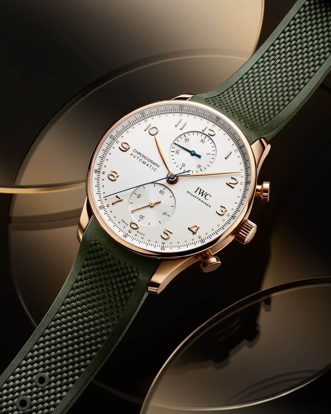 IWCのインスタグラム：「History lesson. Our #IWCportugieser Chronograph, (Ref. IW371611) with a contemporary olive green rubber strap, was originally commissioned in the 1930s by two Portuguese businessmen looking for a wristwatch to match the precision of nautical instruments. Visit your IWC boutique or retailer to discover the variety of strap options available. #TheReference  🔗Link in Bio」