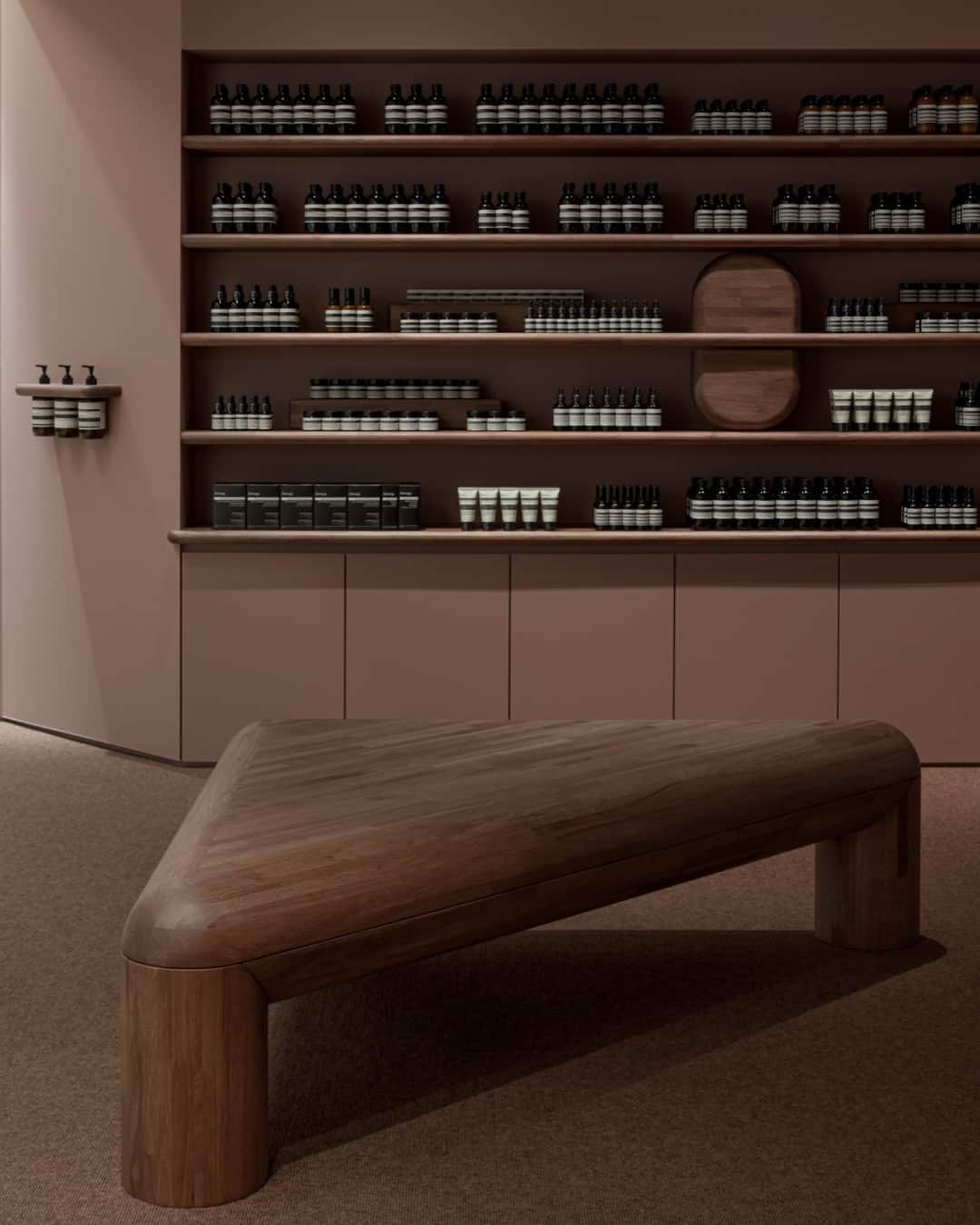 イソップさんのインスタグラム写真 - (イソップInstagram)「Strong curves, warm wood, and smooth details in Nagoya.   At Aesop Takashimaya Gate Tower Mall—designed with longtime collaborators @torafuarchitects—pieces of rounded furniture invite lingering touch. Crafted from Japanese chestnut by local manufacturers Karimoku, they were inspired by a humble yet sculptural stool the designers found sitting outside a house in a nearby street.   Photography by @takuya_yamauchi_photography.」5月17日 3時00分 - aesopskincare