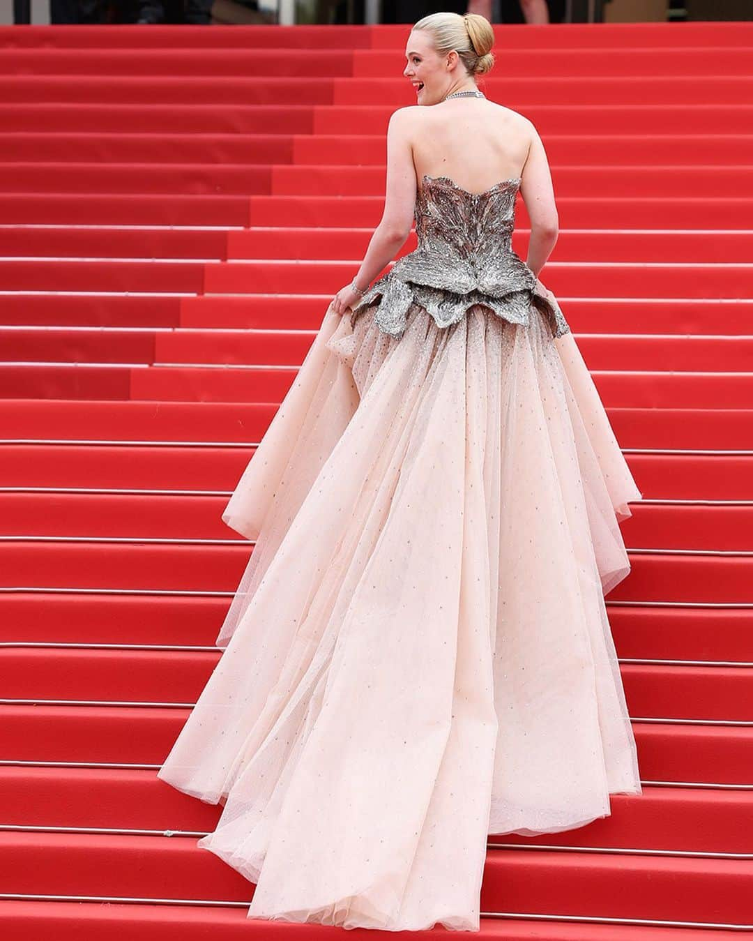 エル・ファニングさんのインスタグラム写真 - (エル・ファニングInstagram)「Always such a joy to celebrate with my L’Oréal Paris family in Cannes ! A beautiful match of beauty and empowerment. Delphine and the entire L’Oréal team is a partnership I cherish deeply.   This creation by Sarah Burton is a work of art. It’s femininity and strength combined in one deconstructed orchid. Getting to work with Sarah directly on my Cannes look was a highlight of my life. The time we shared and the artistry I witnessed from her in the McQueen London studio are a memory I will remember forever. There is no one more kind. I can’t thank Sarah and the McQueen team enough for making my dress of dreams. My jaw is still on the floor over each stone beaded by hand and the fact she did this for me! I love Queen Sarah and McQueen forever!  My Cartier jewels were the absolute perfect cherry on top and made me feel like a princess on the Croisette.」5月17日 7時00分 - ellefanning