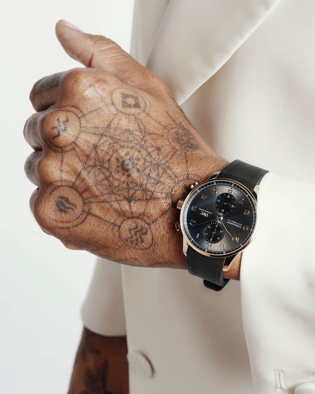 IWCのインスタグラム：「What legends are made of. More than a timepiece, our #IWCportugieser Chronograph (Ref. IW371610) worn by @lewishamilton with a contemporary black rubber strap exudes achievement, confidence and power. Visit your IWC boutique or retailer to discover the variety of strap options available. #TheReference   🔗Link in Bio」