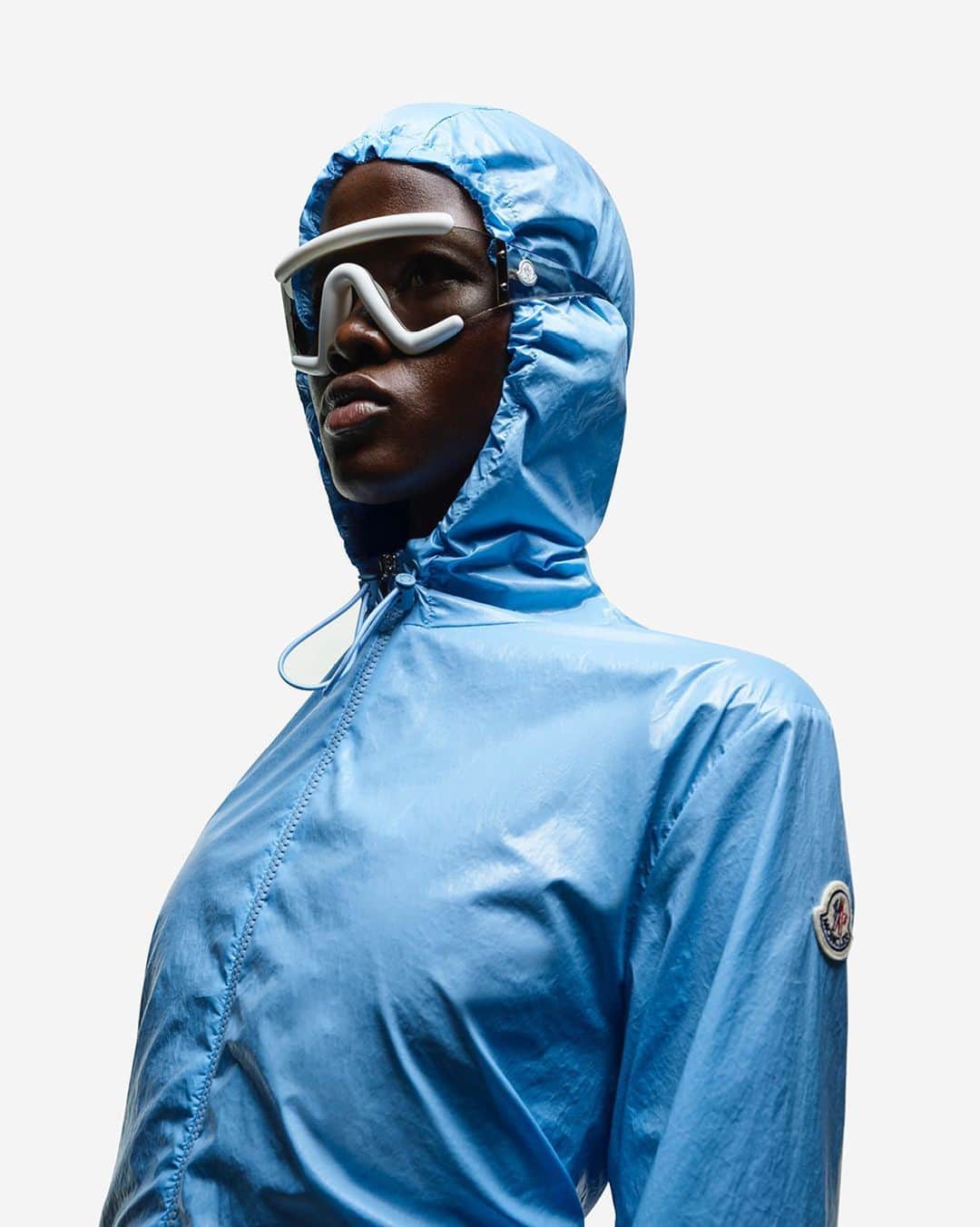 モンクレールのインスタグラム：「Blue skies, or not: Moncler Collection is for all shades of summer.   Shop packable technical outerwear - and shades - at moncler.com.  #MonclerCollection #MonclerLunettes   Photography: @thierrylegouesofficial  Styling: @imruh」