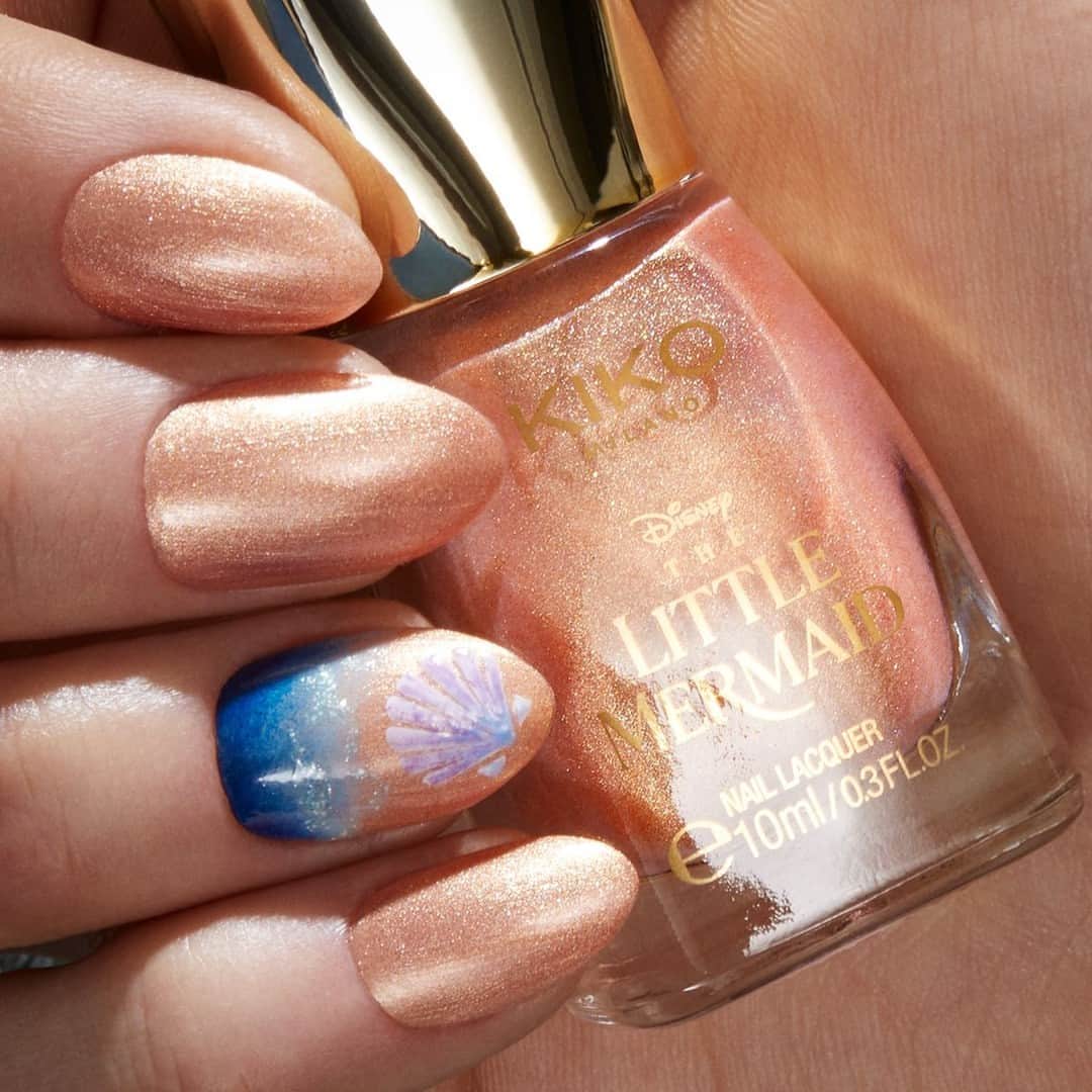 KIKO MILANOさんのインスタグラム写真 - (KIKO MILANOInstagram)「This gleaming gold #naillook was mer-made for you! 💅 Have a stylish summer with our new shiny-finish Nail Lacquers from #KIKOSummer23! 🐚 @DisneyStudiosUK #TheLittleMermaid​⁣ Watch Disney’s The Little Mermaid only in cinemas!​⁣ ⁣ Disney-The Little Mermaid Nail Lacquer 04 - Smart Nail Lacquer 27, 28, 30, 81, 101, 23⁣」5月18日 3時55分 - kikomilano