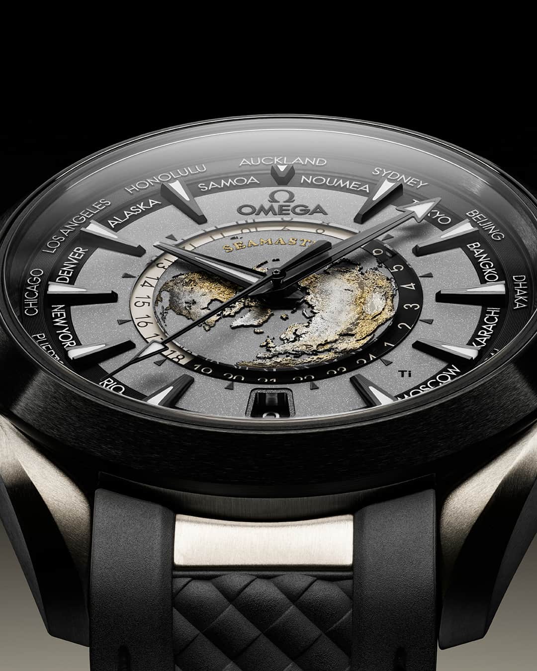 オメガのインスタグラム：「The Worldtimer meets titanium. Discover this unique new model, with a black and grey colourway, a brushed ceramic bezel, and a laser-ablated vision of the Earth.  #OMEGA  #Seamaster  #WorldTimer​」