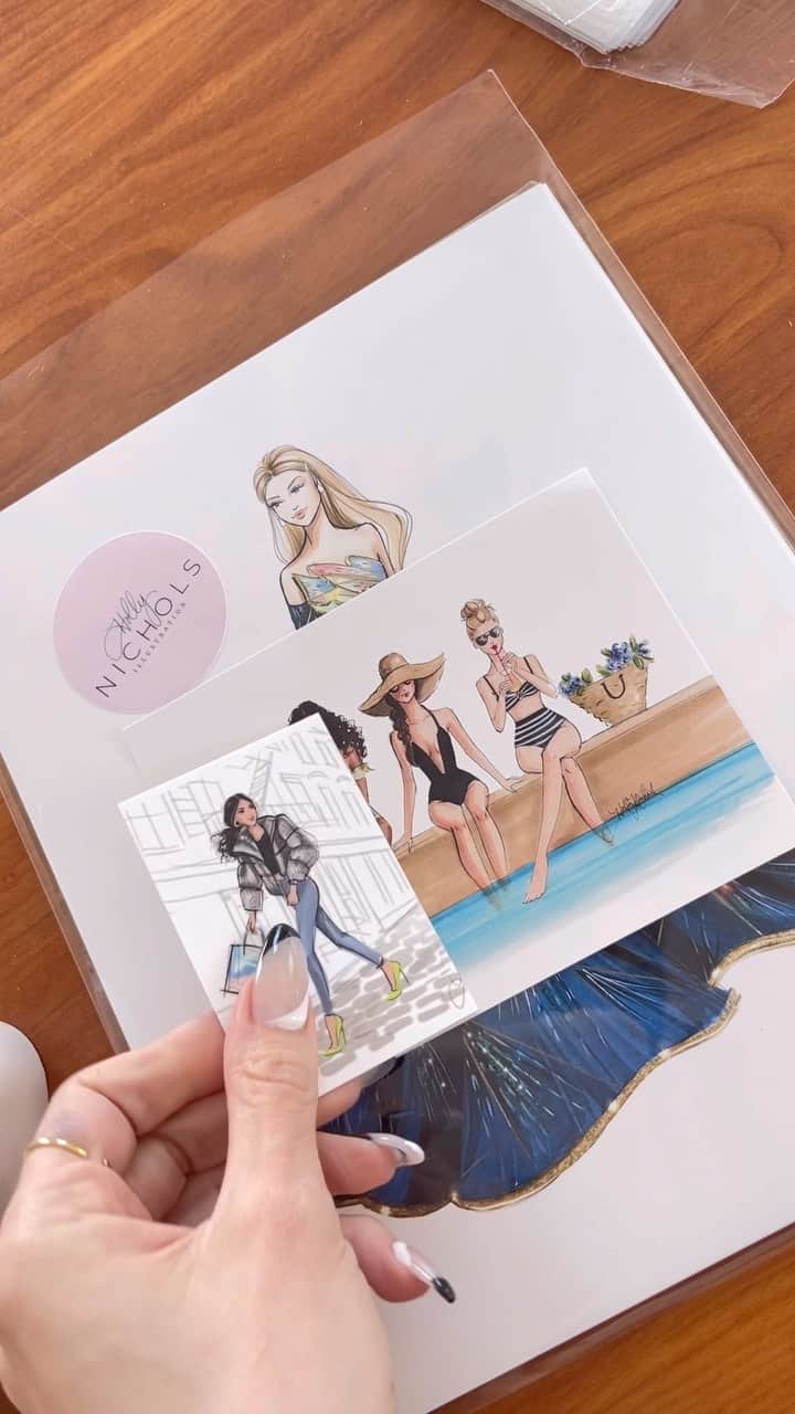 Holly Nicholsのインスタグラム：「Coming up on 10 years of running my art shop! Shop on my Etsy, “Hnillustration” 🩷 #smallbusiness #asmr #asmrsounds #packagingorders #fashionillustration #organization」