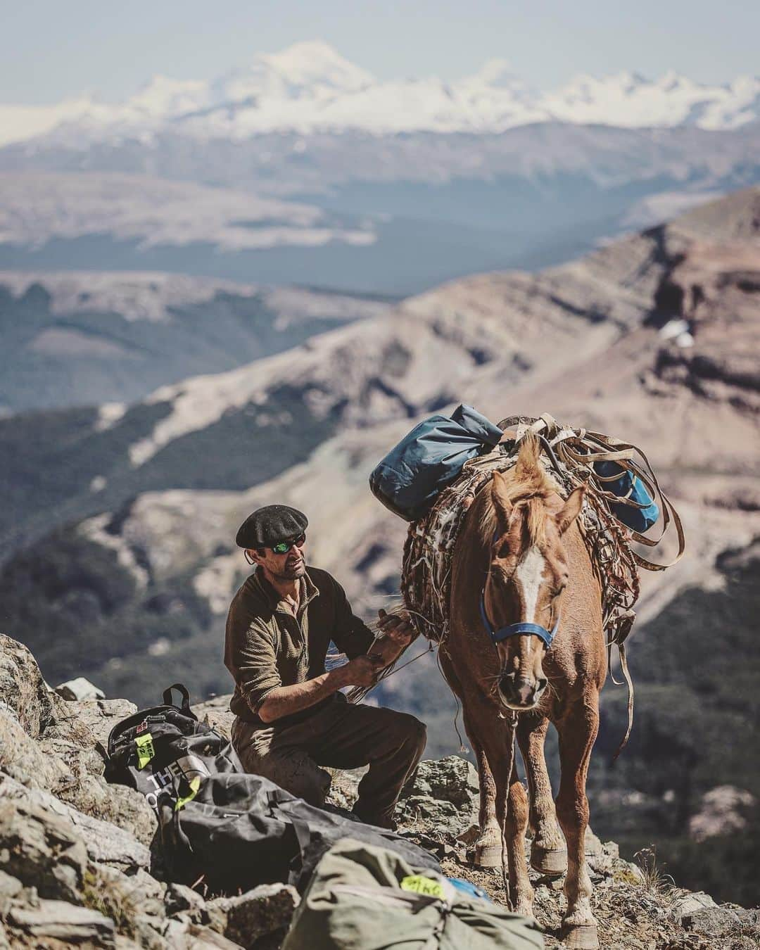 ナショナルジオグラフィックさんのインスタグラム写真 - (ナショナルジオグラフィックInstagram)「Photos by @jimmychin | The film "Wild Life" has been six years in the making. @chaivasarhelyi and I follow conservationists Kristine and the late Doug Tompkins on an epic, decades-spanning love story as wild as the South American landscapes they dedicated their lives to protecting.  Along the way, we worked with Pascual, who led the horse-packing team, carrying gear, production equipment, and supplies for our climb of Cerro Kristine, as seen in the film—a peak first climbed (and named) by Doug in 2009. We couldn’t have done it without Pascual's support and his incredible team.  Pascual is a gaucho. His fortitude and temperament were forged by the windswept landscape of the Patagonian Andes. Watching him ride his horse on steep, third-class terrain while trailing loaded pack horses made me feel like I’d never taken any real risks in my life.  We learned a lot from him. Among other things, we watched, eyes wide and mouths agape, his routine for making coffee over the campfire. After boiling what's known as cowboy coffee, Pascual would pick up the wire handle of the brimming, open pot, then casually windmill it, straight-arm, for 2 minutes until coffee grounds were pressed to the bottom of the pot. He would then serve it hot to everyone around the fire. We called it the gaucho press. All of this is to say, We were very impressed with Pascual.  And we're incredibly excited to share the film with you on @disneyplus and @hulu starting May 26. @tompkins_conservation」5月19日 1時00分 - natgeo