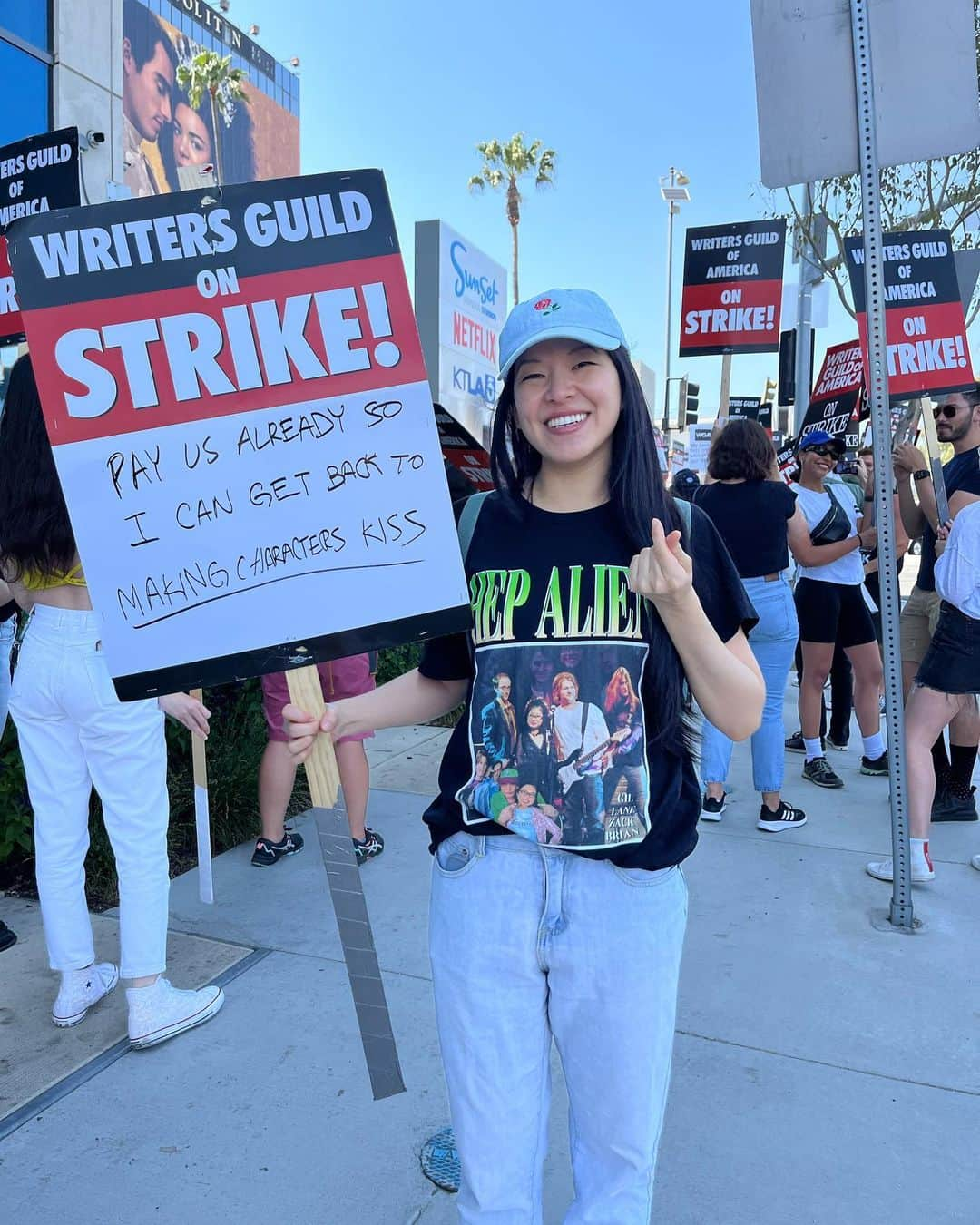 ケイコ・アジェナさんのインスタグラム写真 - (ケイコ・アジェナInstagram)「Pic by @alexsongxia!   Thanks novelist Elaine Hsieh Chou for repping a #HepAlien shirt on the picket lines today. (I’ve never seen that one 💕)   If you LOVE words you’re probably a fan of #GilmoreGirls. (We had all the best words.) Support the WGA so that all the words you love can continue to be written.   Thanks Alex and Terry for also being out there on the picket lines.  #WGAstrong #sagaftramember #1u」5月19日 7時43分 - keikoagena