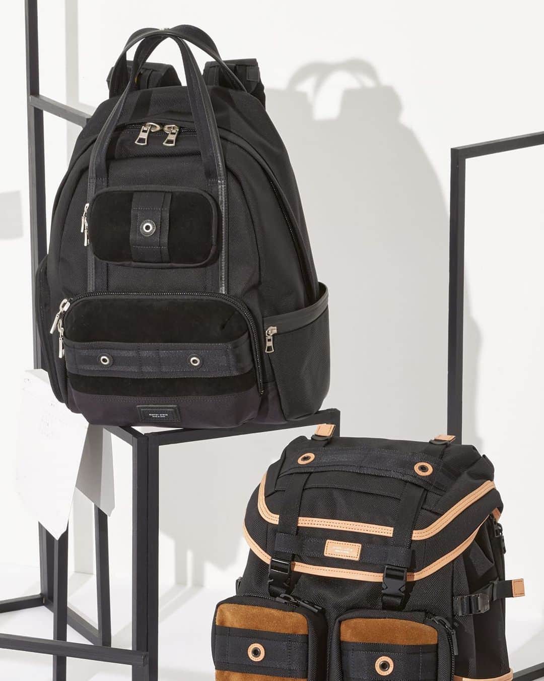 のインスタグラム：「nostalgia 2023SS COLLECTION 5/19.Fri. Release.  本体素材は東レ「ファリーロ ®」を強撚した 1260d の糸をタテヨコに使用した太畝のツイル生地になります。 高強度、高撥水素材を組み合わせミリタリーテイストなデイジーチェーンにアイレットを縁取ったブランドロゴがポイントになったシリーズです。  The main body material is Toray's "Faliro ®, a thick ridged twill fabric that uses a strongly twisted 1260d thread in both the vertical and horizontal directions. This series that combines high-strength and highly water-repellent materials with a military-style details and with logo-bordered eyelets.  #masterpiece #2023SS #madeinjapan #マスターピース」