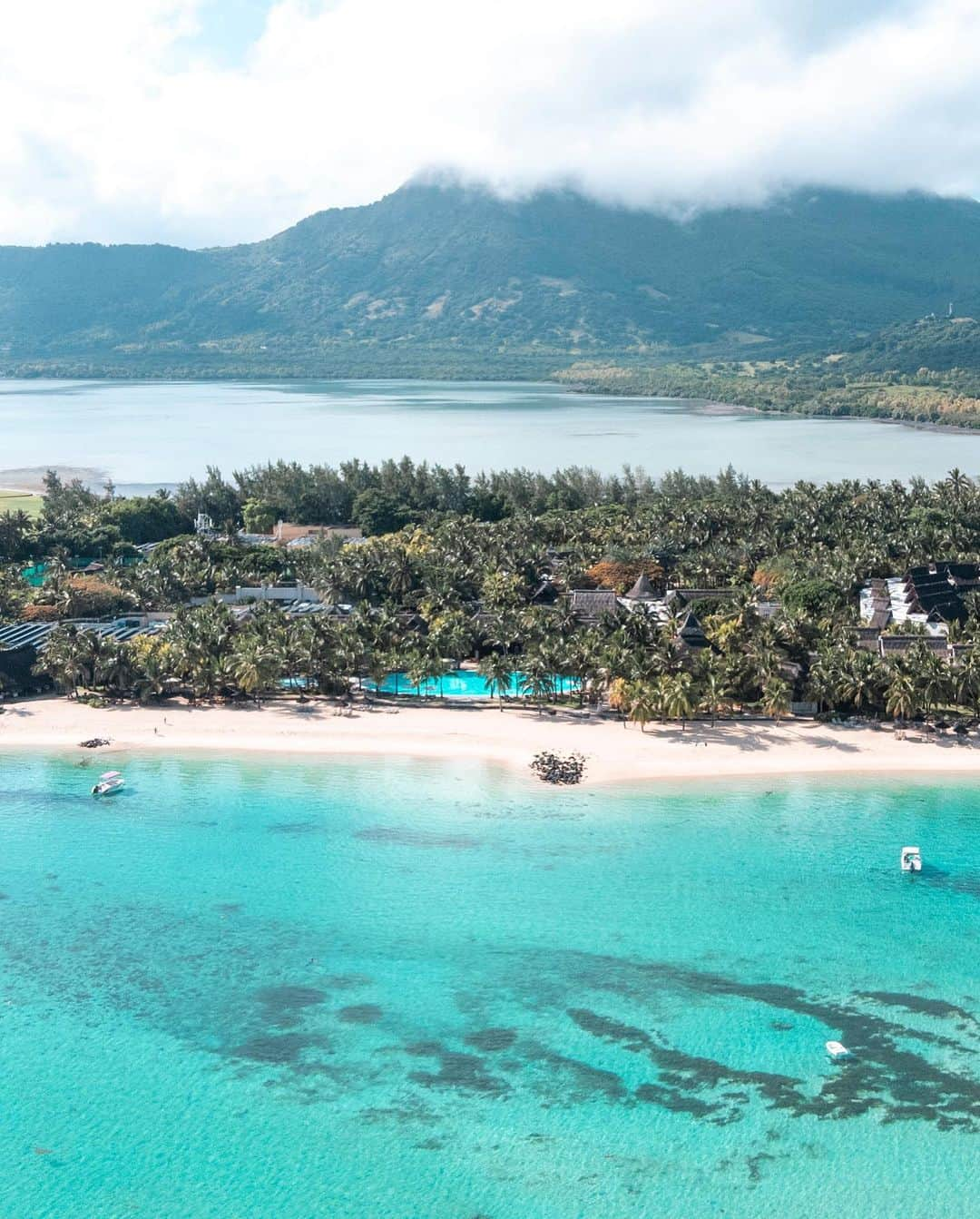 さんのインスタグラム写真 - (Instagram)「A collection of the beautiful resort views from my trip to Mauritius 🏝️ @mauritius.tourism ✨ Which is your fave 1, 2, 3, 4….10?  My first stay was in Flic en Flac @sandssuitesresortandspa then to the south western tip to Le Morne @paradisbeachcomber and then north to @theoberoimauritius 🌊  Each resort and each location brought something special and unique to this trip. The @sandssuitesresortandspa was ideally located not too far from the airport and also within reach of exploring the Black River region. These morning sunrise views were beyond breathtaking. @paradisbeachcomber sits on an idyllic beachfront of white sand and turquoise water with the grandness of Le Morne Brabant in the background. There is so much to do in this area from exploring Chamarel, visiting the Seven coloured earth Geopark and waterfall, rum tasting at a rum distillery and taking a seaplane from La Prairie beach to view the underwater waterfall illusion 🪸  About an hour away is Blue bay marine park, a turquoise dream where you can snorkel and even take a day trip on a catamaran to Ile aux Cerfs - a dreamy island paradise that even has a waterfall 🏝️   As you venture north to @theoberoimauritius you’ll get the chance to stop and explore the Hindu Sacred water temple in Grand Bassin and take in the majestic views. Another must stop is @escalecreole for some delicious authentic creole food right in the home of the most beautiful locals.   Once you reach the Oberoi resort you might not want to leave. It has the best snorkeling right there and wild dolphin and turtle swims straight from the boathouse 🐢   All my stays, tours, where to eat and travel tips are now on my blog {link in bio} so you can start planning your island getaway ☀️   And if you’re Perth based you can now take a direct flight to Mauritius with @airmauritius and be in paradise before you know it ✈️  #MauritiusNow #mauritius #africa #luxuryresort #travelcommunity #perthblogger #airmauritius」5月19日 18時34分 - helen_jannesonbense