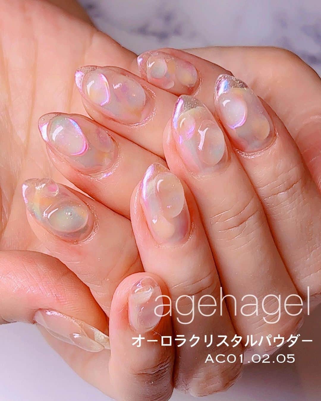 agehaのインスタグラム：「新商品 #agehaACパウダー  めちゃくちゃ可愛い😍  #クリアネイル #うるっとしずく   ランダムにACパウダーをスリスリするだけで、可愛いですー😍  クリアドロップと、 イクステンションは、 agehaミキシングビルダージェル を使いました^ ^  agehaACパウダーは、 5月23日発売です❤️ 私のイチオシは、、 AC05！！^ ^」