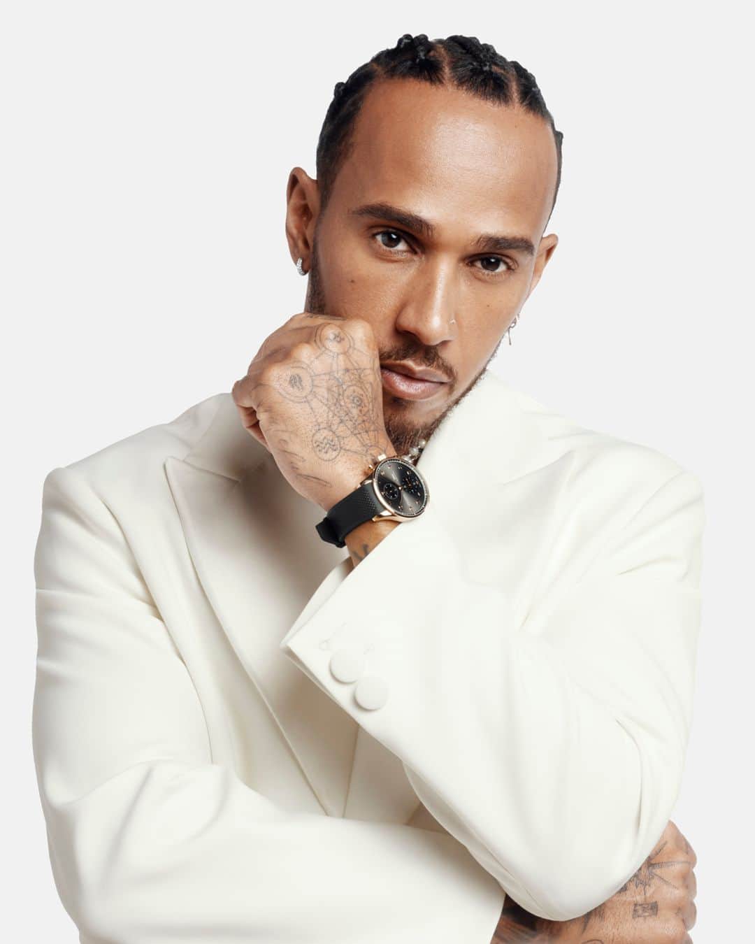 IWCのインスタグラム：「Statement maker = @lewishamilton. Our #IWCportugieser Chronograph (Ref. IW371610) on a new black rubber strap is a timepiece that speaks volumes for those looking for their unapologetic accessory of self expression. Visit your IWC boutique or retailer to discover the variety of strap options available. #TheReference   🔗Link in Bio」
