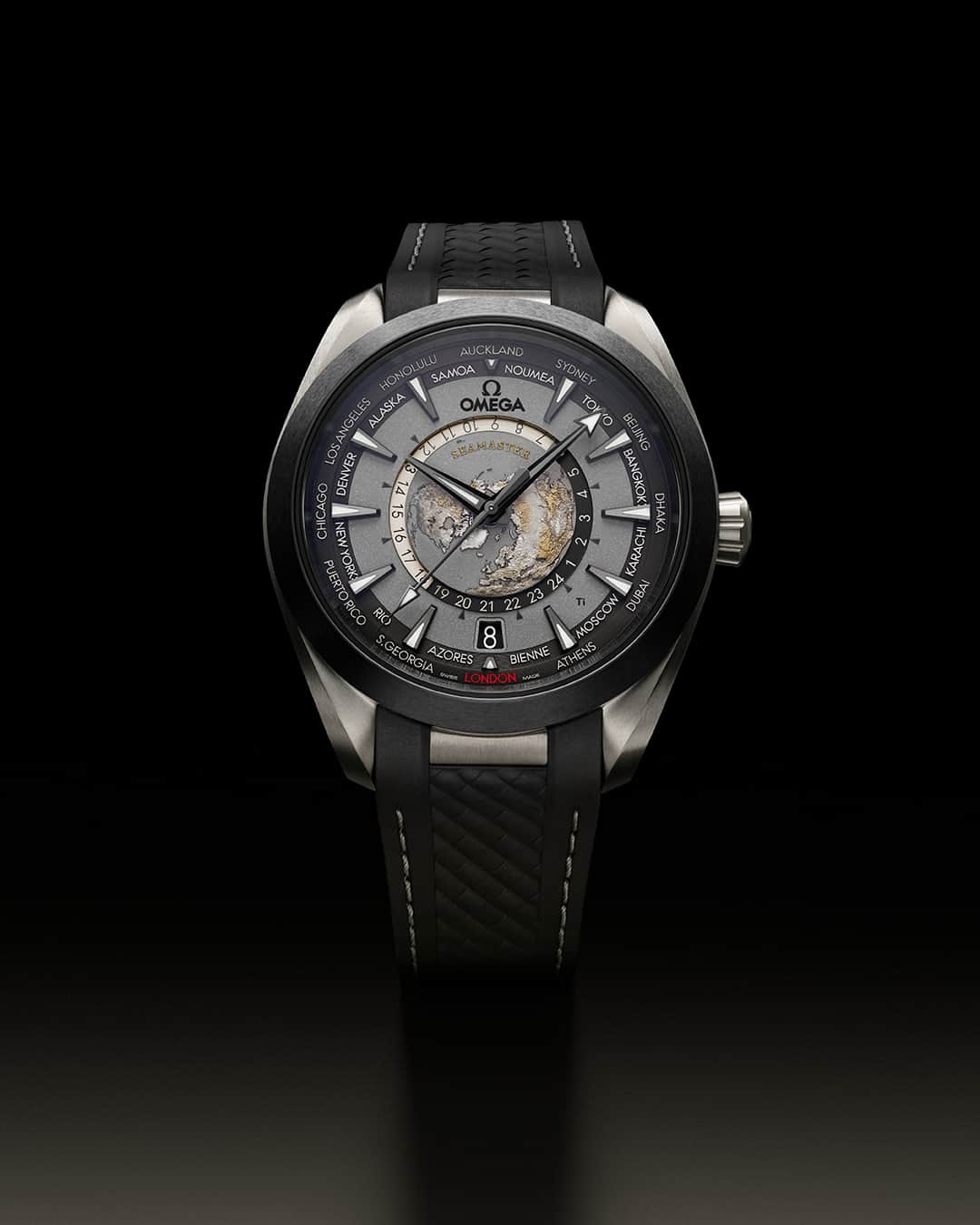 のインスタグラム：「Our lightweight 43 mm Worldtimer in titanium is presented on a structured black rubber strap with grey stitching, and features a brushed black ceramic bezel.  #OMEGA  #Seamaster  #WorldTimer」
