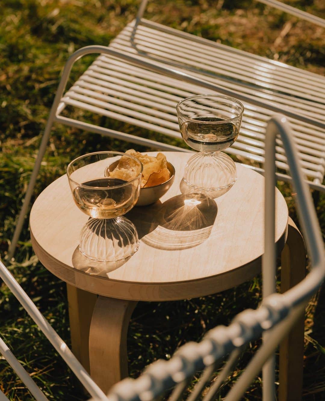 Artekのインスタグラム：「Take your Stool 60 outside on a sunny evening and your aperitivo set up is ready! Cheers 🥂」