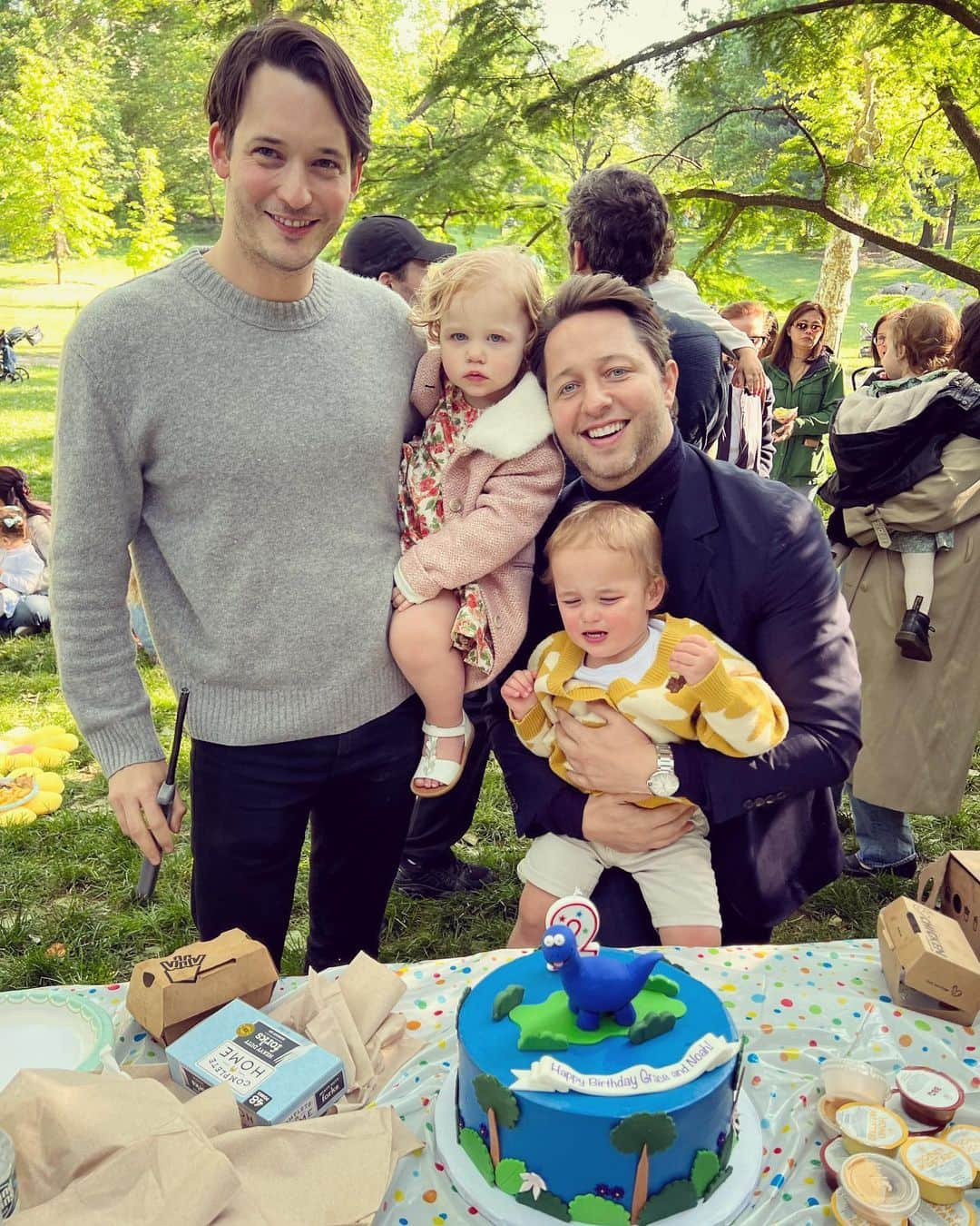 デレク・ブラスバーグさんのインスタグラム写真 - (デレク・ブラスバーグInstagram)「TWO! Yesterday, Grace and Noah turned two years old and we celebrated with a dino-themed party in Central Park. (Grace is particularly proud of her roar—second slide, sound on, for proof.) Once I overcame the fear of a child stepping on a used syringe or discovering a nut allergy the hard way, we felt like extras in a Nora Ephron movie on a picturesque, crisp spring New York afternoon. TWO YEARS OLD! These kiddos changed my life and I feel like the luckiest man in the whole world. Fine, one of the two luckiest men in the world, OK @nickbrown? 😍🎂🦕👨‍👨‍👧‍👦」5月20日 3時06分 - derekblasberg