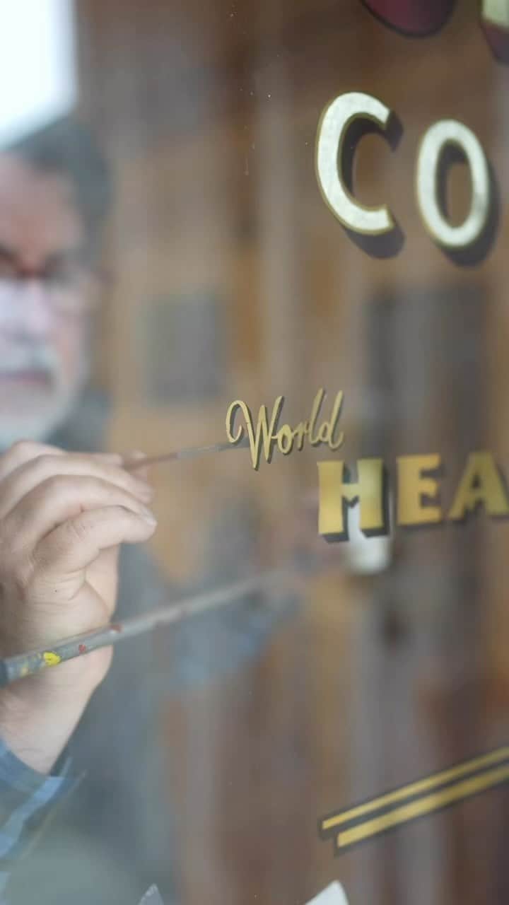 Stumptown Coffee Roastersのインスタグラム：「Peter McKernan is a skilled sign painter who has been with us since the very beginning.   He started painting signs in 1979 and has since specialized in gold leaf, learning from many talented craftsmen throughout the country.   His studio was located near our original Division Cafe, and he has since painted the signs in all of our Portland cafes, as well as two of our NYC cafes, some retail signage, and van lettering.   Fun fact: his favorite coffee order is a latte! ☕️❤️」