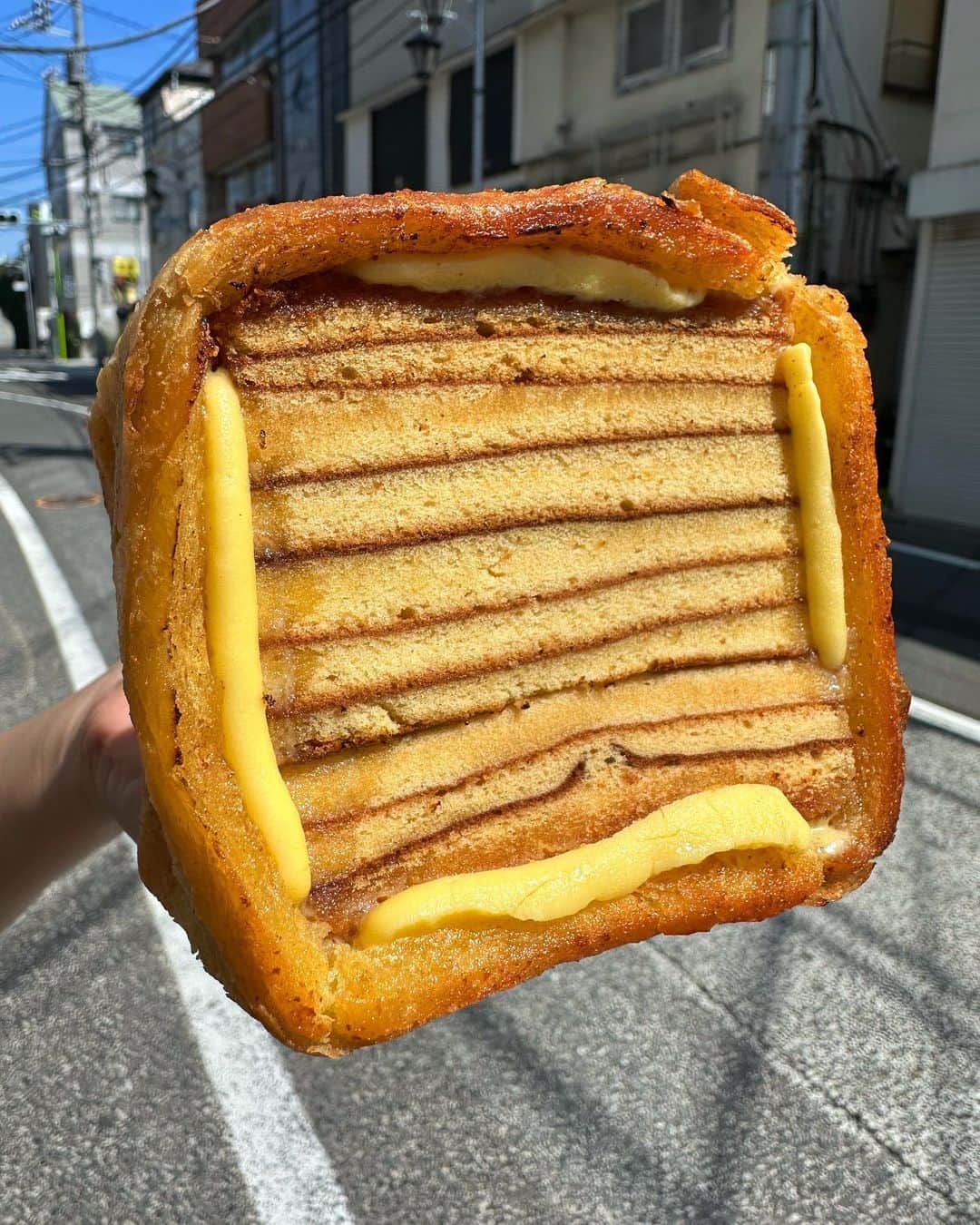 Coffee & Toast Tokyoさんのインスタグラム写真 - (Coffee & Toast TokyoInstagram)「"しみしみバターの"バウムクーヘントースト！ 💛💛💛💛💛💛💛💛  “With enough butter, anything is Good.”  サクサクのパンにバウムクーヘンみたいにしっとり焼いたケーキをたっぷりのバターで！  バターしみしみのバウムクーヘンのパン、たまらんです。  . . . . .  #バターバウムクーヘントースト #バウムクーヘン  #バター  #baumkuchen  #butter  #layered  #Prügelkrapfen #baamkuch  #spettekaka  #trdelník  #kurtoskalacs  #sekacz  #šakotis   #三軒茶屋ランチ  #世田谷線カフェ  #パンスタグラム  #東京カフェ  #三軒茶屋カフェ #三軒茶屋  #パン #三茶カフェ  #三茶 #田園都市線カフェ #コーヒーアンドトースト  #coffeeandtoast #foodie  #foodiegram」5月20日 18時19分 - coffeetoast2