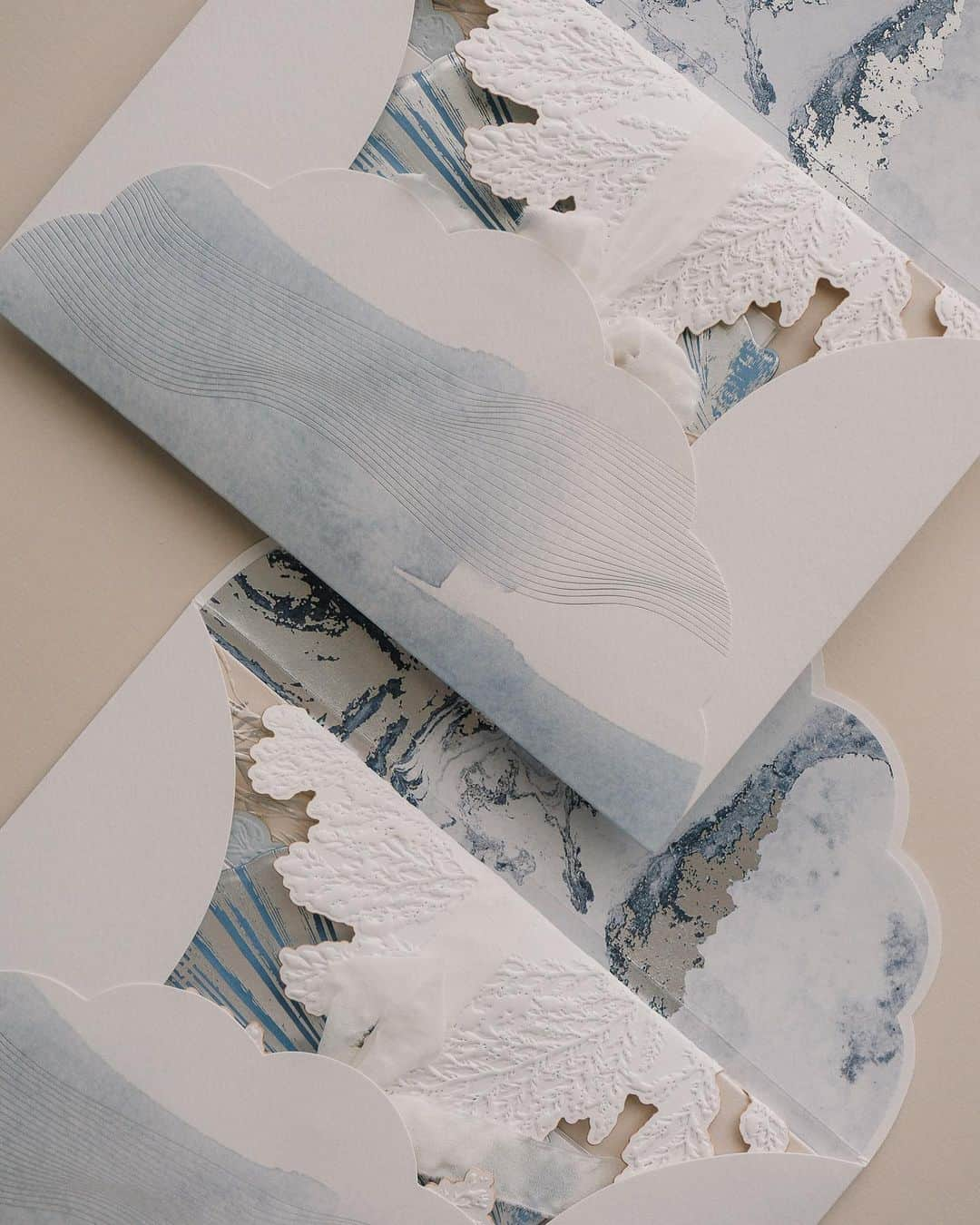 Veronica Halimさんのインスタグラム写真 - (Veronica HalimInstagram)「A custom wedding suite design for H&J that captures the ocean's beauty. Using abstract marble patterns in the liner, we brought out the texture and colors of the sea.  ⠀⠀⠀⠀⠀⠀⠀⠀⠀ We explored different visual and print finishes to enhance the suite's appeal and showcase the textures of coral, shell, and sea waves bundled together, creating a wonderful unwrapping experience. ⠀⠀⠀⠀⠀⠀⠀⠀⠀ Thank you for trusting us to create freely from start to finish. Creating this suite was an absolute joy for us! —  #truffypi #カリグラフィー #カリグラフィースタイリング #モダンカリグラフィー #calligraphystyling #weddinginvitation #weddingstationery #moderncalligraphy #embossed  #paperlovers #ウェディング #ウェディングアイテム #カリグラファ #veronicahalim #スタイリング #prettypapers #weddingsuite #bali  #ldvh #amankila #baliwedding」5月21日 11時35分 - truffypi