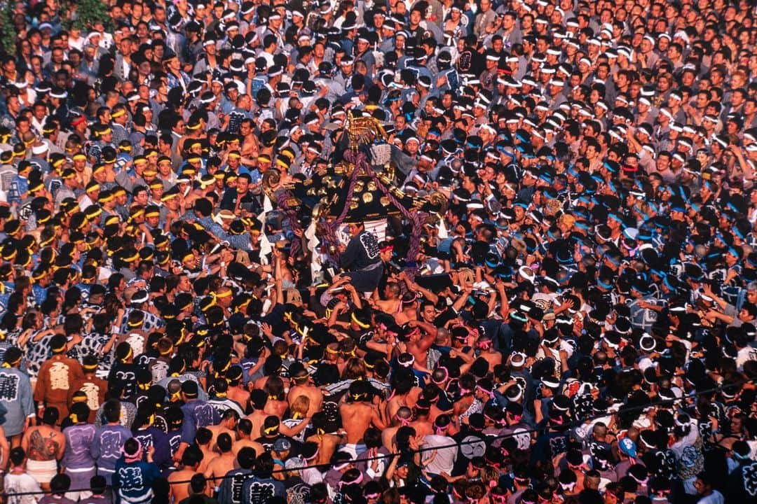Michael Yamashitaのインスタグラム：「Sanja Matsuri (3 Shrine festival), on the the grounds of Sensoji Temple, Asakusa: Mosh pit mentality overtakes Tokyo today, the final day of the festival as competitive neighborhood groups surround the mikoshi (portable shrines) vying for the chance to carry one, receiving good luck and prosperity in return. Spectators are not allowed beyond Sensoji's entrance gates during this part of the festival due to space and safety concerns. To call it one of Tokyo’s most popular and crowded festivals is clearly not an understatement. #sanjamatsuri #sanja #asakusatokyo #asakusa #sensoji #tokyofestival #japanesefestival」