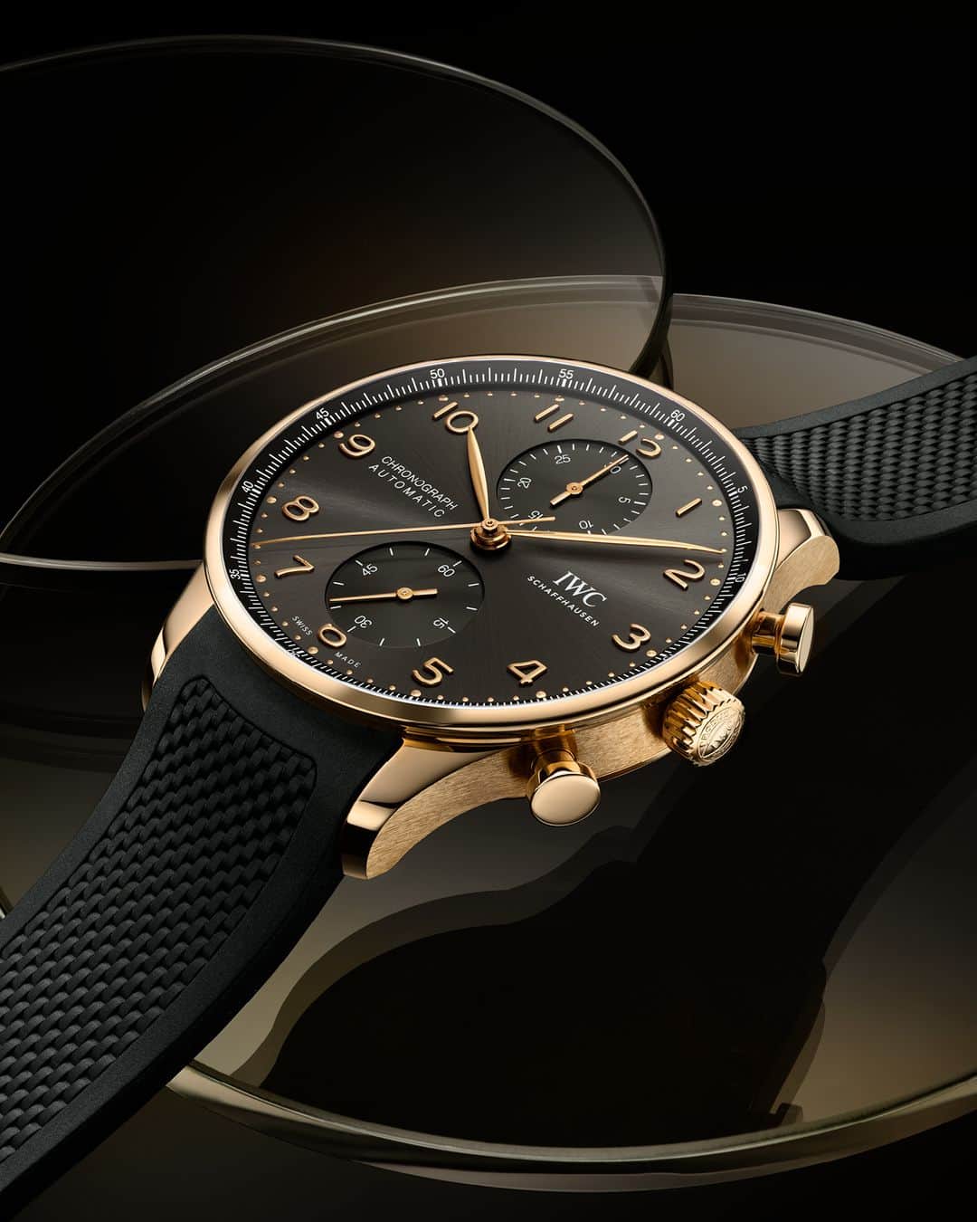 IWCのインスタグラム：「Modern and timeless. Our #IWCportugieser Chronograph (Ref. IW371610) on the new black rubber strap, has achieved cult status among watches. Visit your IWC boutique or retailer to discover the variety of strap options available. #TheReference  🔗Link in Bio」