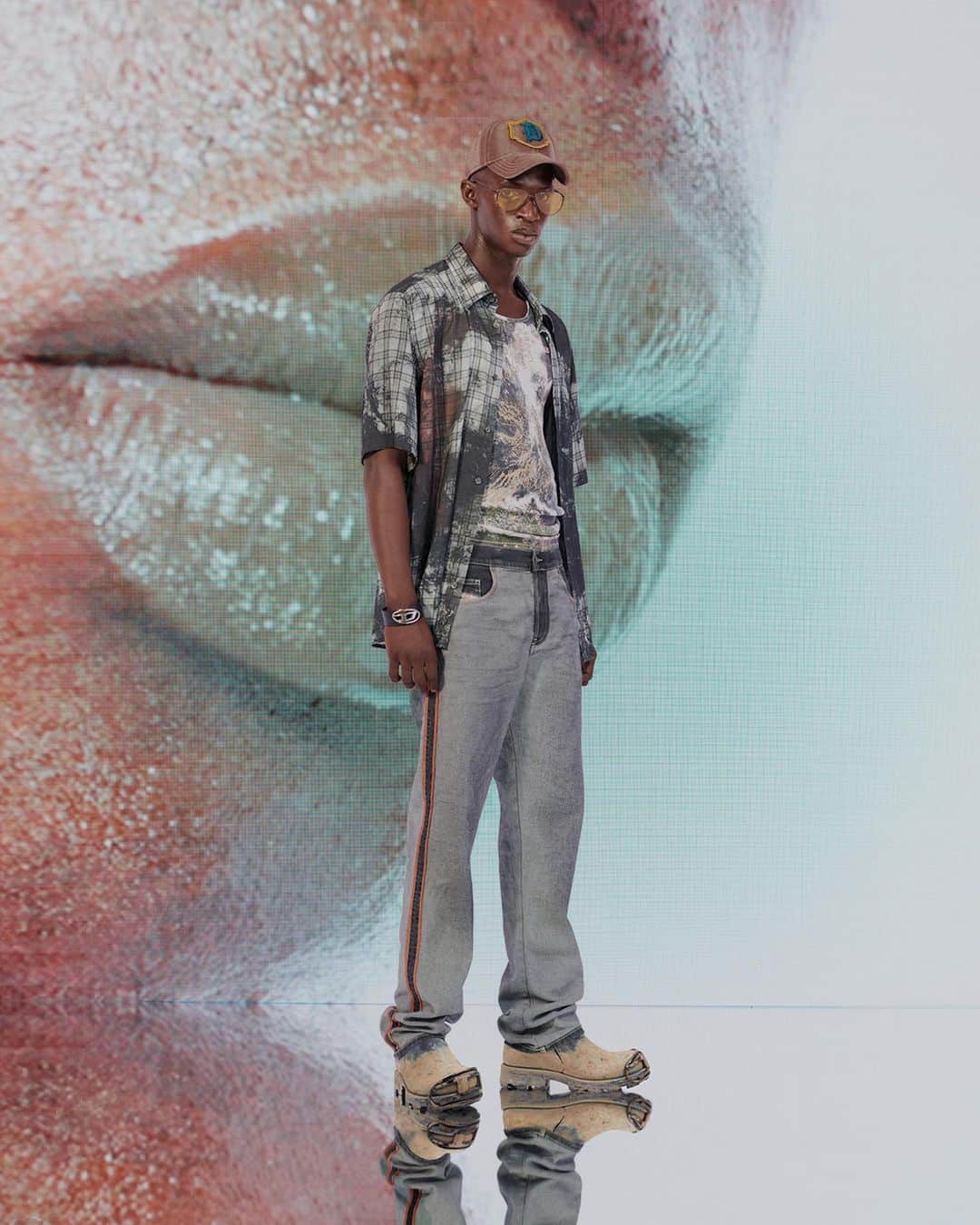 ディーゼルのインスタグラム：「Change in the weather.    Layer up in the Planet Camo print from #DieselFW23, a new take on camouflage done with images of the Earth from space. It’s applied to shirts T-shirts, a draped dress, underwear and boots.    Discover more at the link in bio.   #ForSuccessfulLiving」