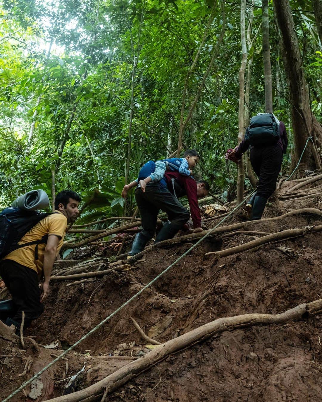 ニューヨーク・タイムズさんのインスタグラム写真 - (ニューヨーク・タイムズInstagram)「Thousands of Afghans have taken the long, dangerous route through the Darién Gap, trekking more than 16,000 miles in hopes of reaching the American border.  For countless Afghans, the frenetic days of the U.S. withdrawal were only the beginning of a long, harrowing search for safety. To escape the Taliban and their country’s economic collapse in the last 17 months, more than 3,600 Afghans have taken this unfathomable route — a trek through the sliver of land connecting North and South America —  since the beginning of 2022, according to tallies in Panama, which is one of the most perilous sections of their journey to the U.S. border. They have trudged through the jungle, slept on the forest floor amid fire ants and snakes, and hid their money in their food to fool thieves.  Many of these Afghans had partnered with the West for years — lawyers, human rights advocates, members of the Afghan government or security forces. They packed up their children, parents or entire families, sold their apartments and borrowed enormous sums to pay for the passage, convinced there was nothing left for them back home.  To make the trip, the Afghans wend through about a dozen countries, for months or longer. Nearly all are robbed or extorted; some are kidnapped or jailed. Others are fought over by rival smugglers or sent back to countries they already passed through. Parents and children are divided by the authorities. Babies have been born along the way.  The New York Times’s Andes bureau chief, @fotojulie, and the photographer @historiassencillas traveled with a group of 54 Afghans through the notorious Darién Gap, one of the hardest parts of the journey, and interviewed nearly 100 people making the trek. Many spoke English, had entwined their lives with the Western mission in Afghanistan and hoped that, as American allies, they would be received at the border with open arms. Tap the link in our bio to travel through the jungle with the Afghan migrants.」5月24日 2時01分 - nytimes