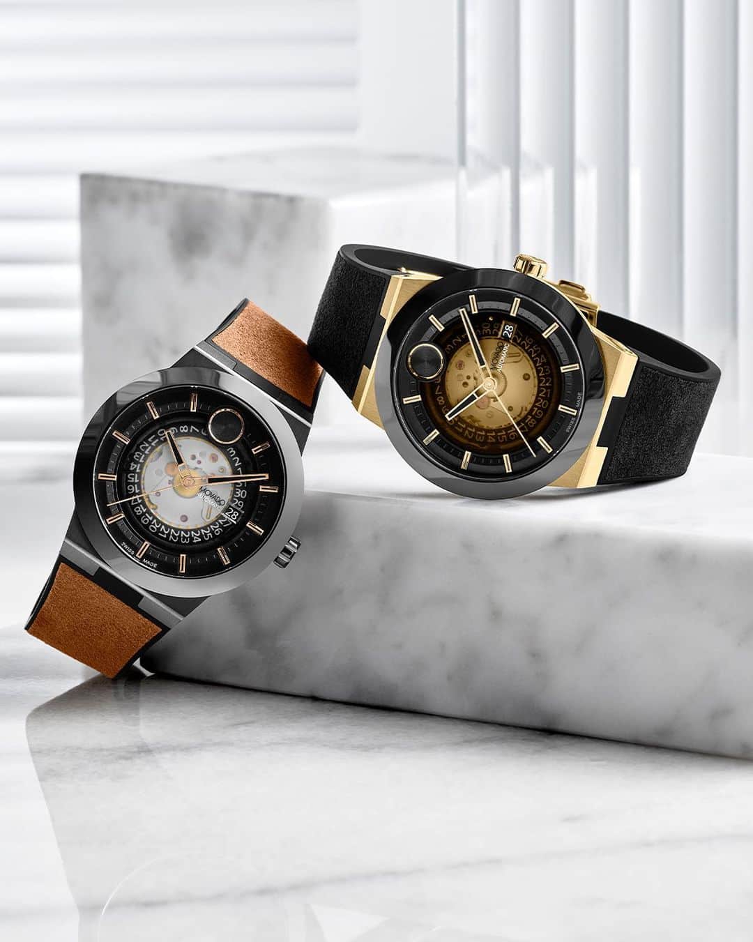 モバードのインスタグラム：「An ultra-modern statement. Our sleek #MovadoBold Fusion Automatics boast a 44mm case, black ceramic bezel, and  captivating exhibition dial that reveals the beauty of its automatic movement. Tap to learn more.」