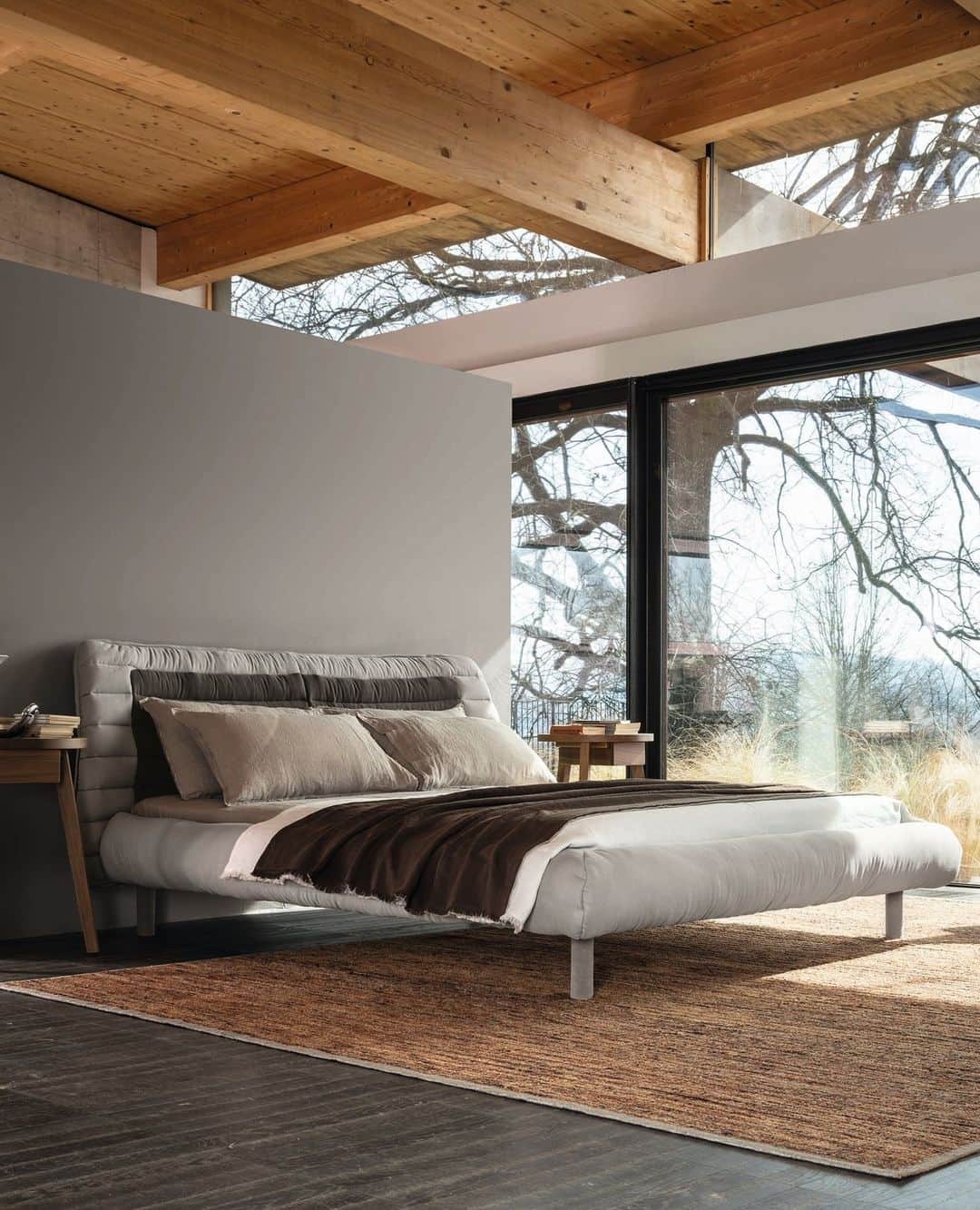 のインスタグラム：「PLUMEAU bed / soft and sinuous shapes that call to mind the textile world, in a product by @cristinacelestino⁠ ⁠ Crafted with the intention of reimagining nocturnal well-being with a modern touch, this design draws inspiration from the artistic essence of Asian nomad communities. ⁠ ⁠ Discover the collection by clicking on our link in bio. ⁠ ⁠ Styling @ilariabacciocchi⁠ Photo @maxrommel」