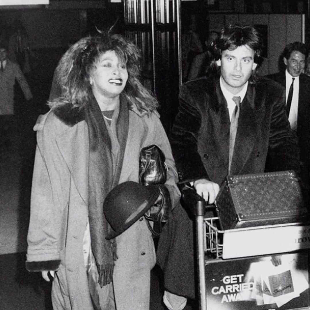 People Magazineさんのインスタグラム写真 - (People MagazineInstagram)「Tina Turner, the Queen of Rock 'n' Roll, found her king when she met her future second husband Erwin Bach at an airport nearly 40 years ago. ❤️  The music legend — who died at age 83 on Wednesday after a "long illness," her rep confirmed — opened up about her romance with Bach, now 67, in her 2021 HBO documentary Tina.  "He was [16 years] younger [than me]. He was 30 years old at the time and had the prettiest face. I mean, you cannot [describe] it. It was like insane. [I thought], 'Where did he come from?' He was really so good-looking. My heart [was beating fast] and it means that a soul has met, and my hands were shaking," Turner recalled in the film. Tap the link in bio for more on their love story. l 📷: Dave Hogan/Hulton Archive/Getty; Alamy」5月25日 7時26分 - people
