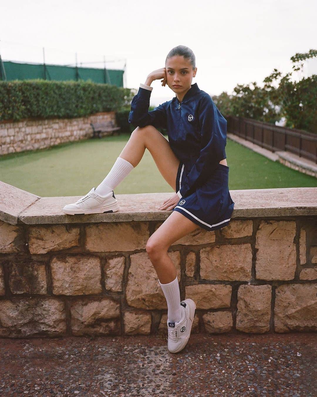 セルジオタッキーニのインスタグラム：「Our Rosina Bomber Jacket and Kalkman Tennis Skirt are the perfect combo for the warm Spring weather. Both styles are available in Maritime blue and Foliage green at sergiotacchini.com.」
