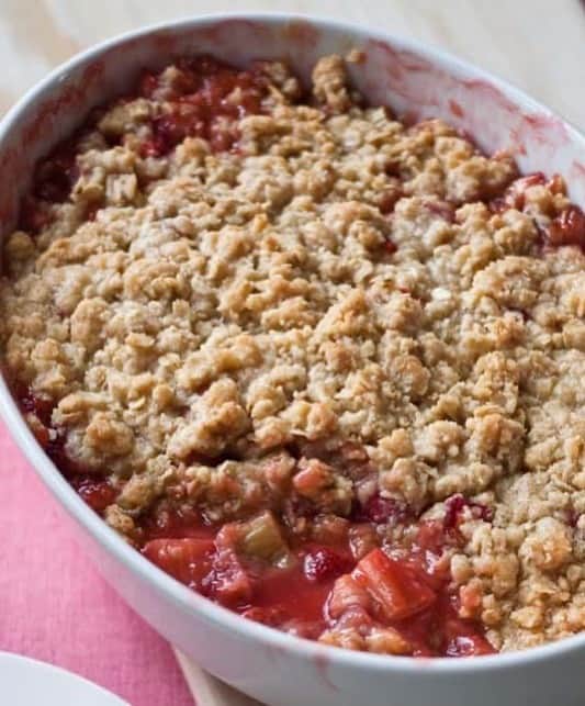 アイナ・ガーテンのインスタグラム：「Is there anything more delicious in the Spring than a warm Strawberry Rhubarb Crisp?  Mine has a little orange zest to bring out all the fresh fruit flavors. I serve it with a big scoop of vanilla ice cream. As the late, great Tina Turner might say, it's simply the best! Recipe link in profile.  📸: @quentinbaconphoto」