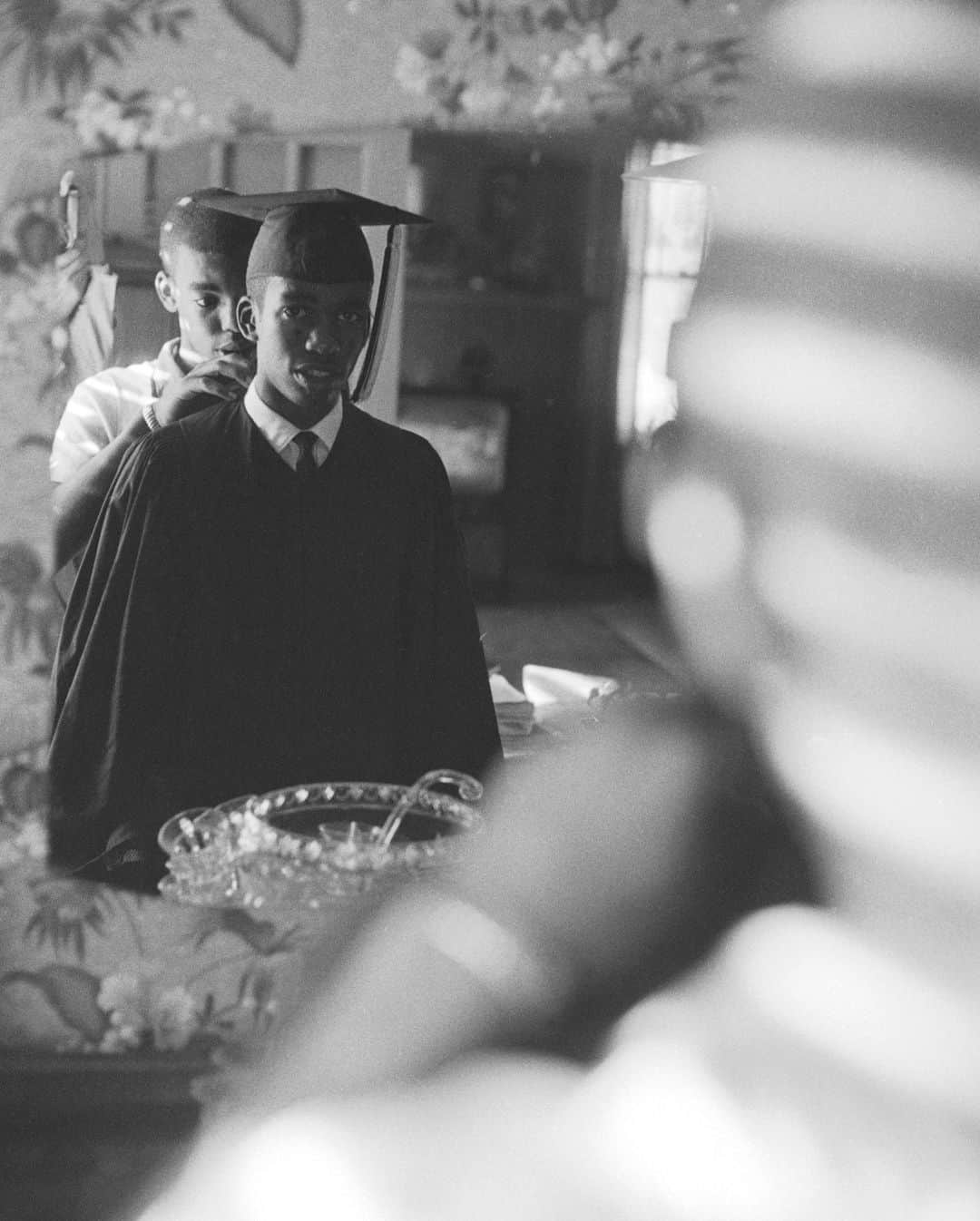 lifeさんのインスタグラム写真 - (lifeInstagram)「High school student Ernest Green looks out from the mirror as he prepares to attend his graduation ceremony and become the first African-American to graduate from Central High School in Little Rock, Arkansas on May 27th, 1958.   Green was one of the Little Rock Nine, a group of high school students who attempted to enroll in Little Rock Central High School and were initially prevented by Governor Orval Faubus who called on the National Guard to stop the school's integration. Click the link in bio to see more of LIFE's coverage of his historic graduation. 🎓  (📷 Grey Villet/LIFE Picture Collection)  #LIFEMagazine #LIFEArchive #ErnestGreen #GreyVillet #Graduation #LIttleRockNine #Arkansas #Historic #1950s」5月28日 0時30分 - life